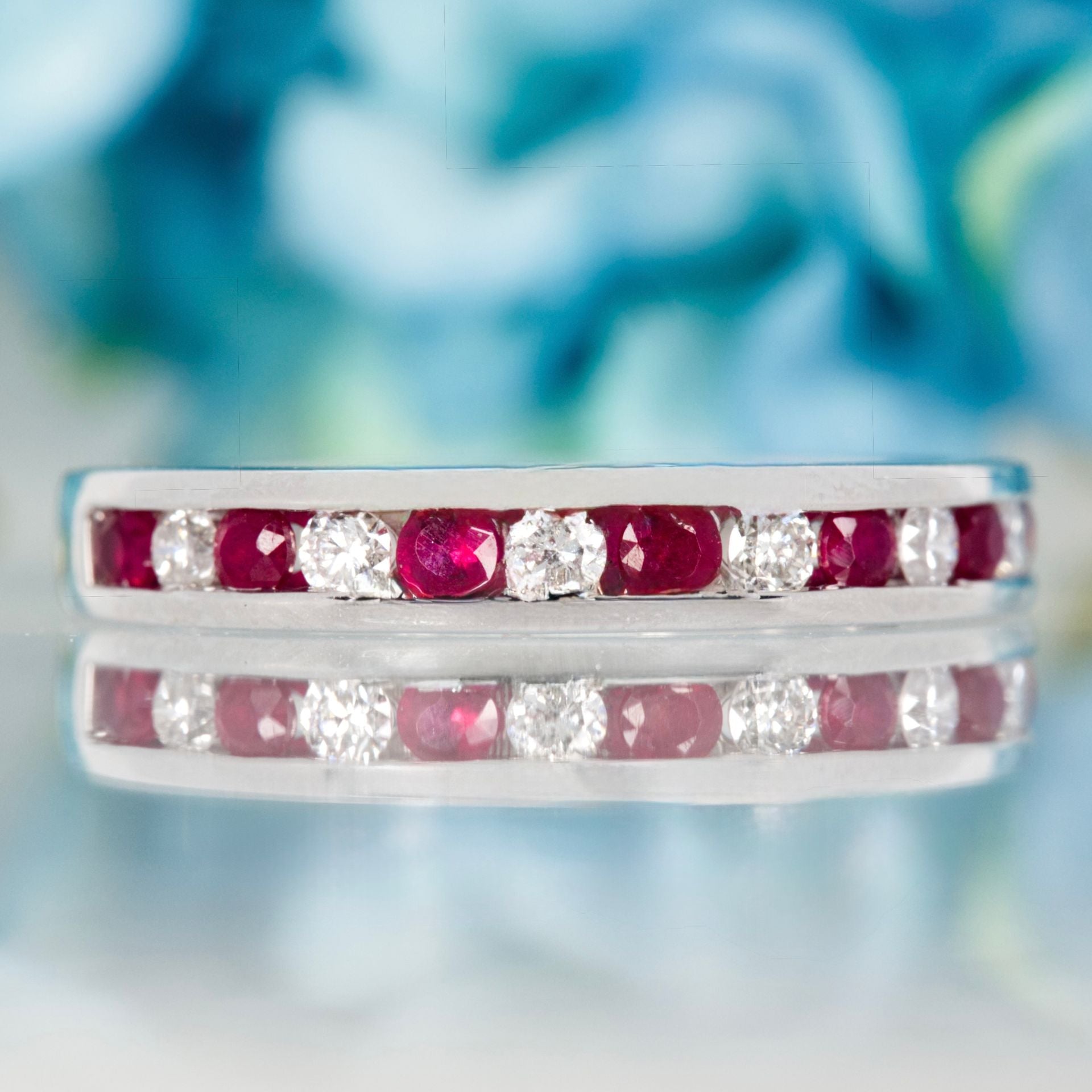 Platinum Round Cut Ruby & Diamond Channel Set Half Eternity Ring