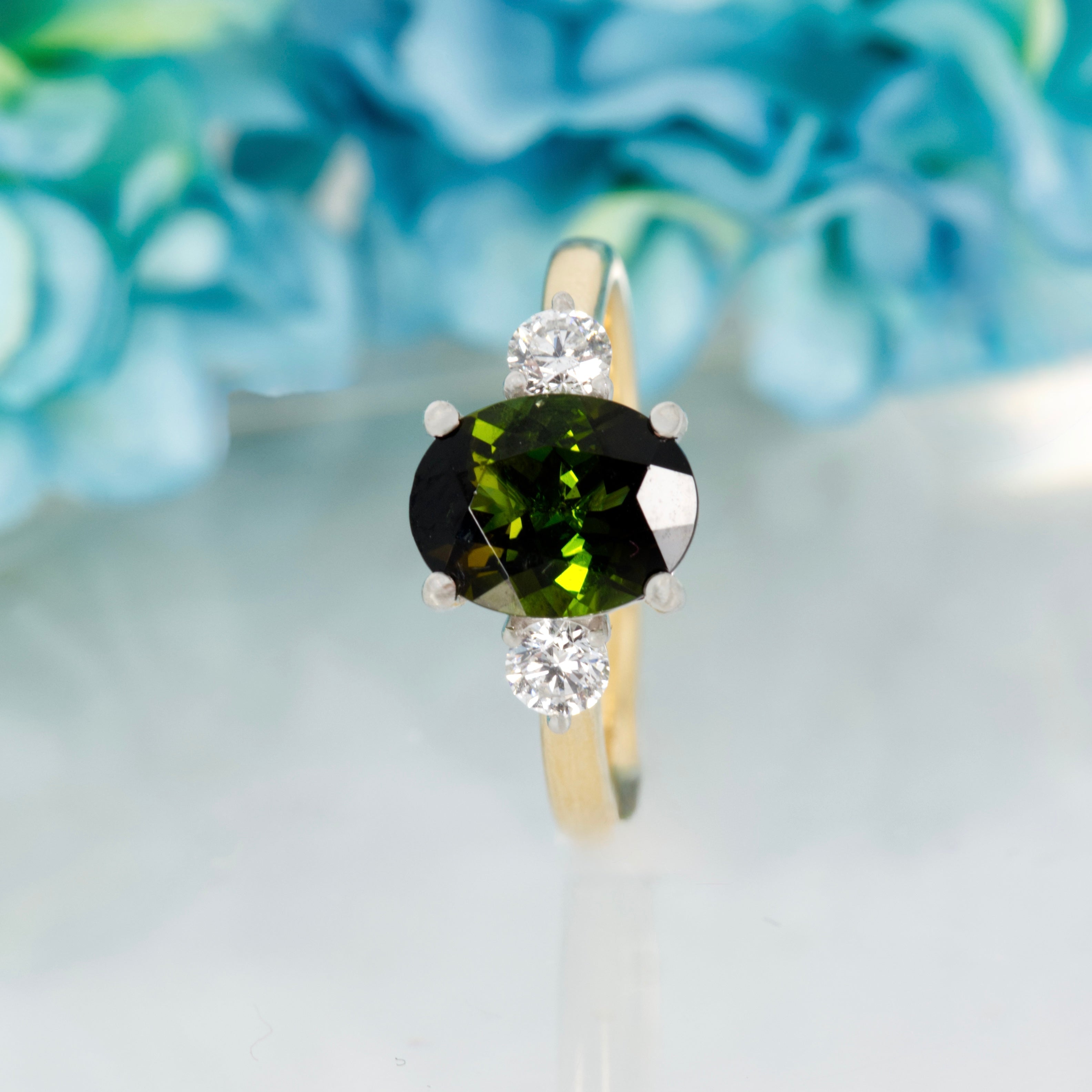18ct Yellow Gold & Platinum Oval Cut Green Tourmaline & Round Brilliant Cut Diamond Trilogy Ring