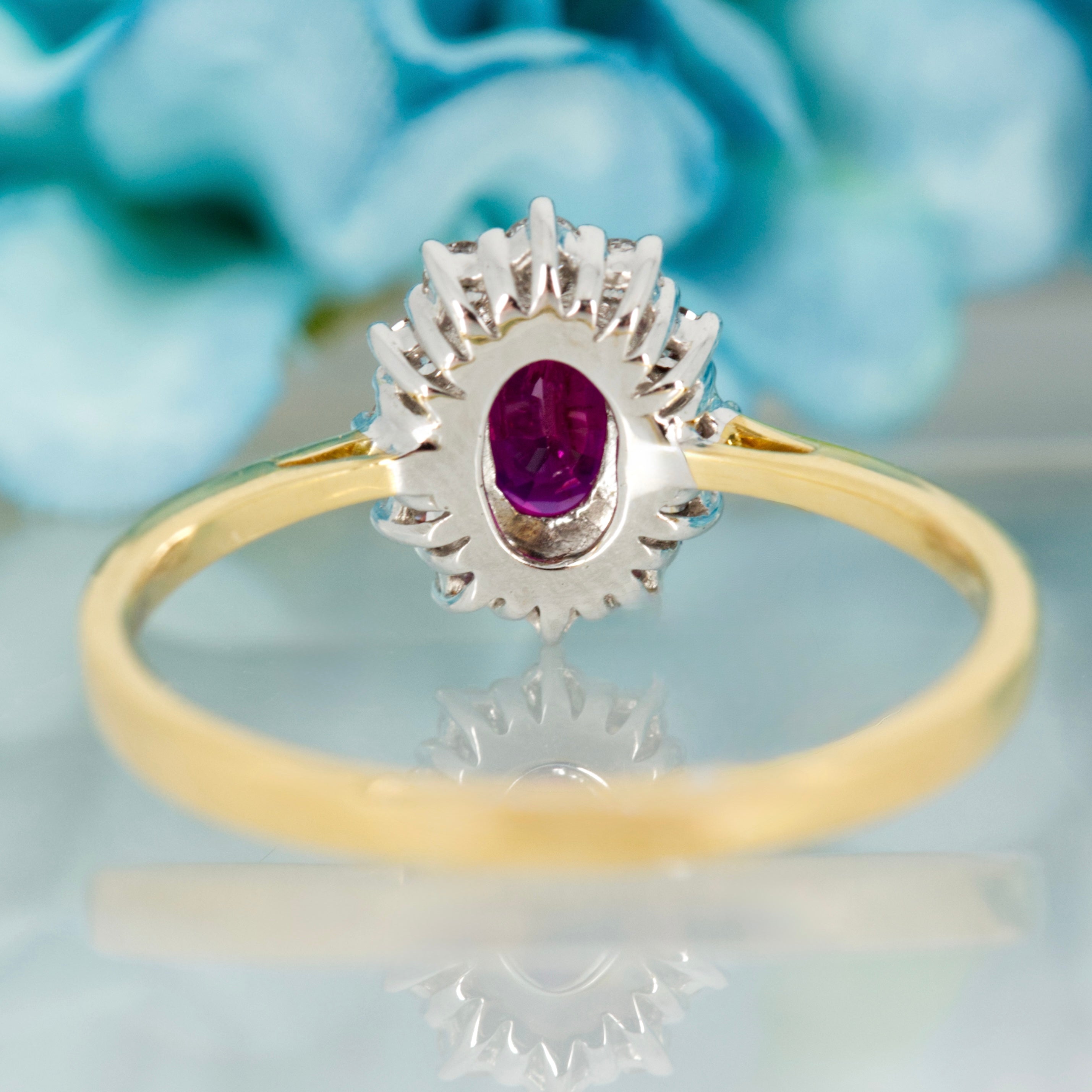 18ct Yellow Gold Oval Cut Ruby & Round Brilliant Cut Diamond Cluster Ring