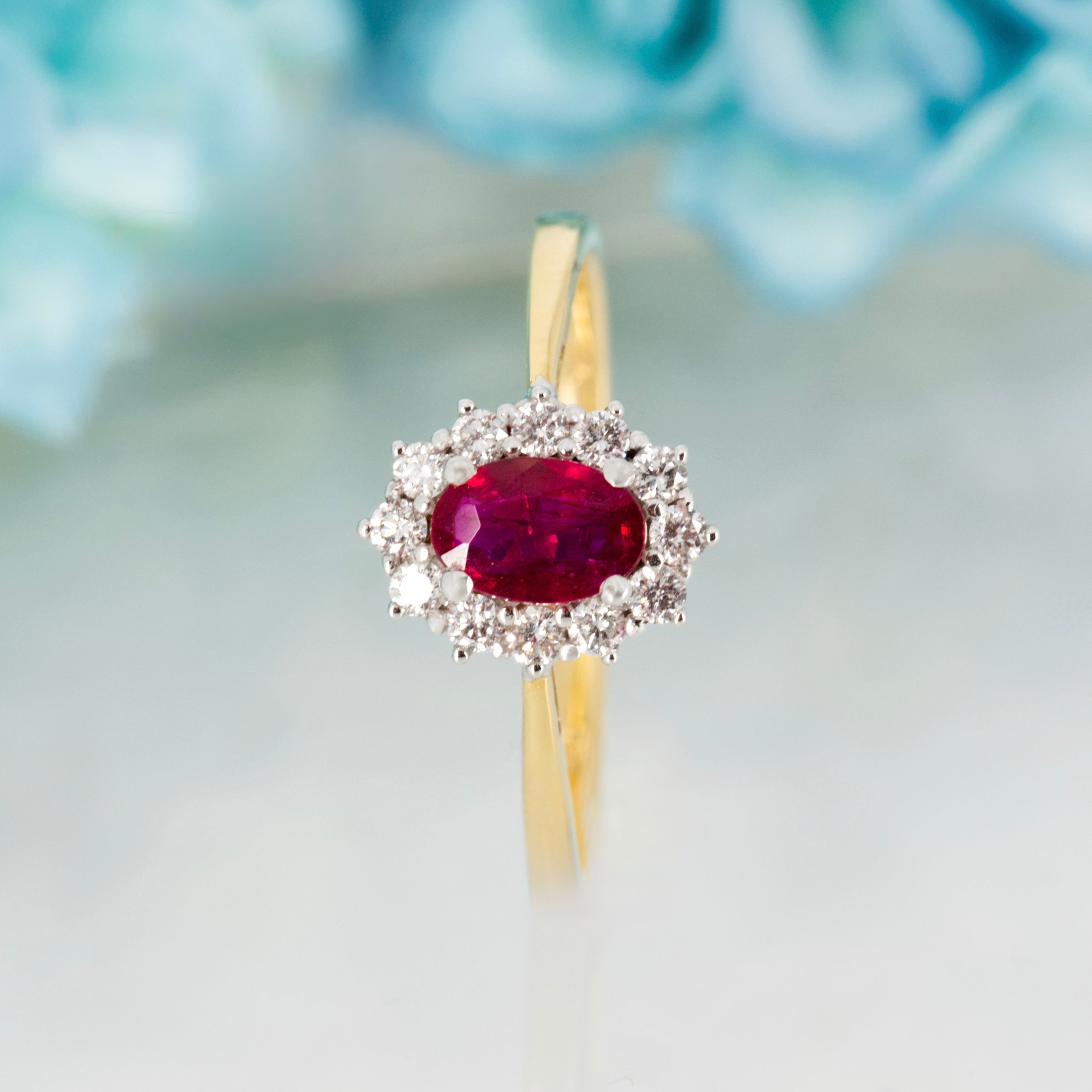 18ct Yellow Gold Oval Cut Ruby & Round Brilliant Cut Diamond Cluster Ring