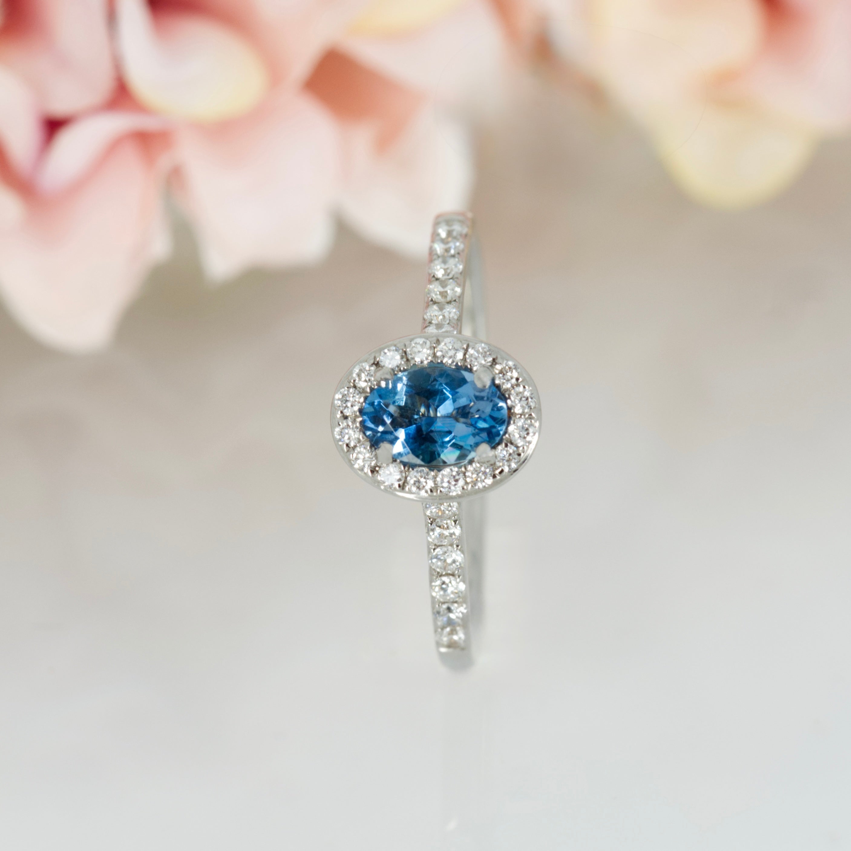 18ct White Gold Oval Cut Aquamarine & Round Brilliant Cut Diamond Halo Cluster Ring