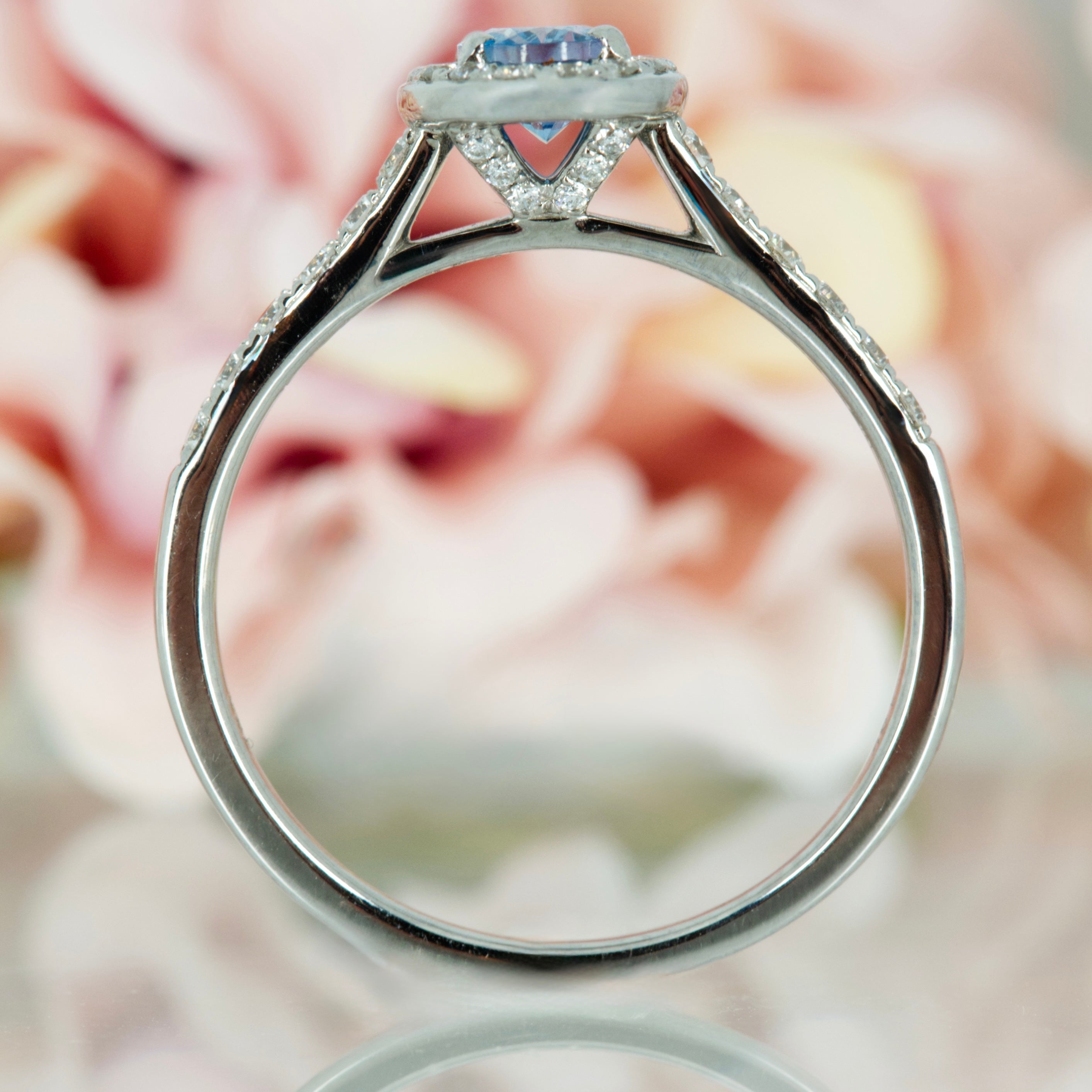 18ct White Gold Oval Cut Aquamarine & Round Brilliant Cut Diamond Halo Cluster Ring