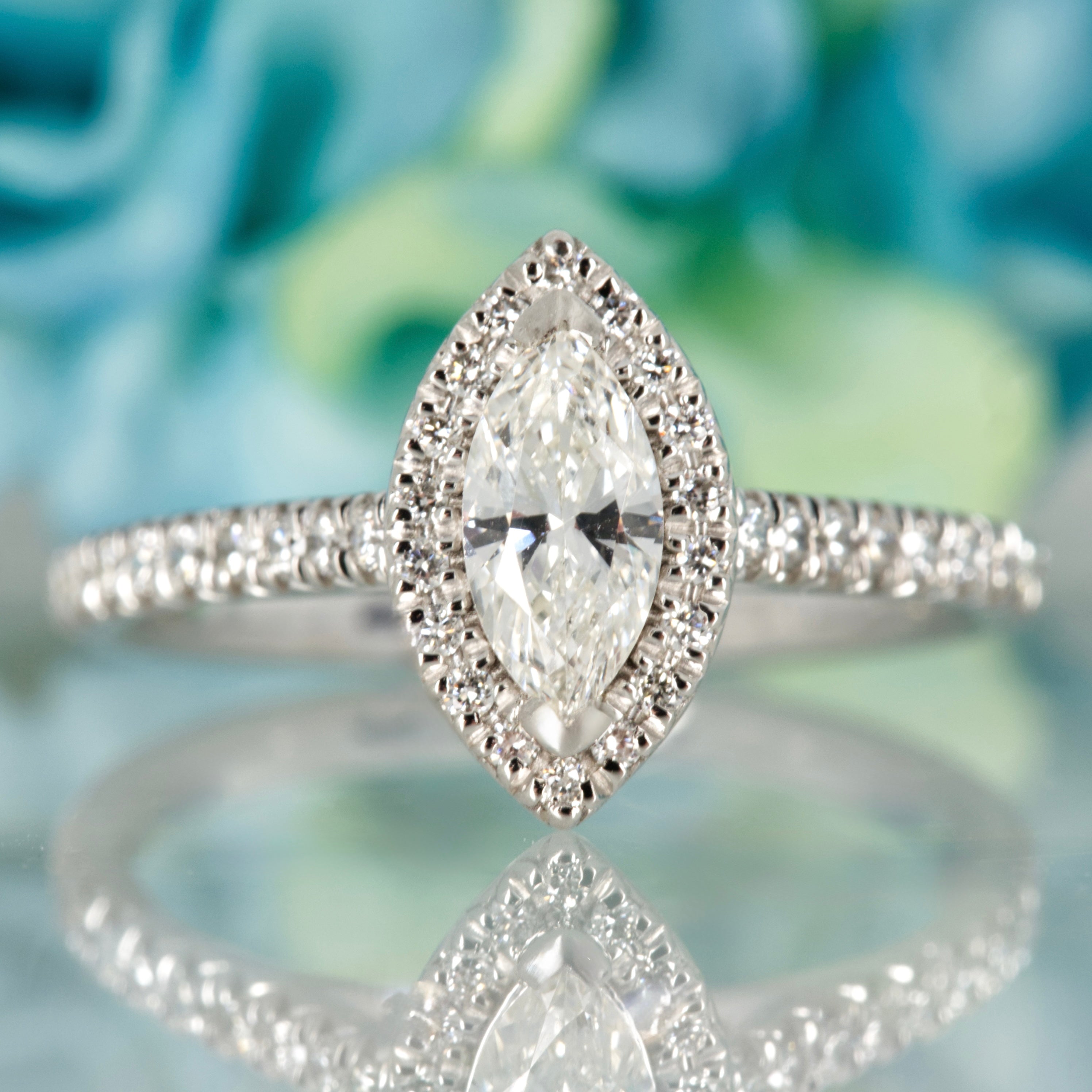 Platinum GIA Certified Marquise Cut Diamond & Round Brilliant Cut Diamond Halo Cluster Ring