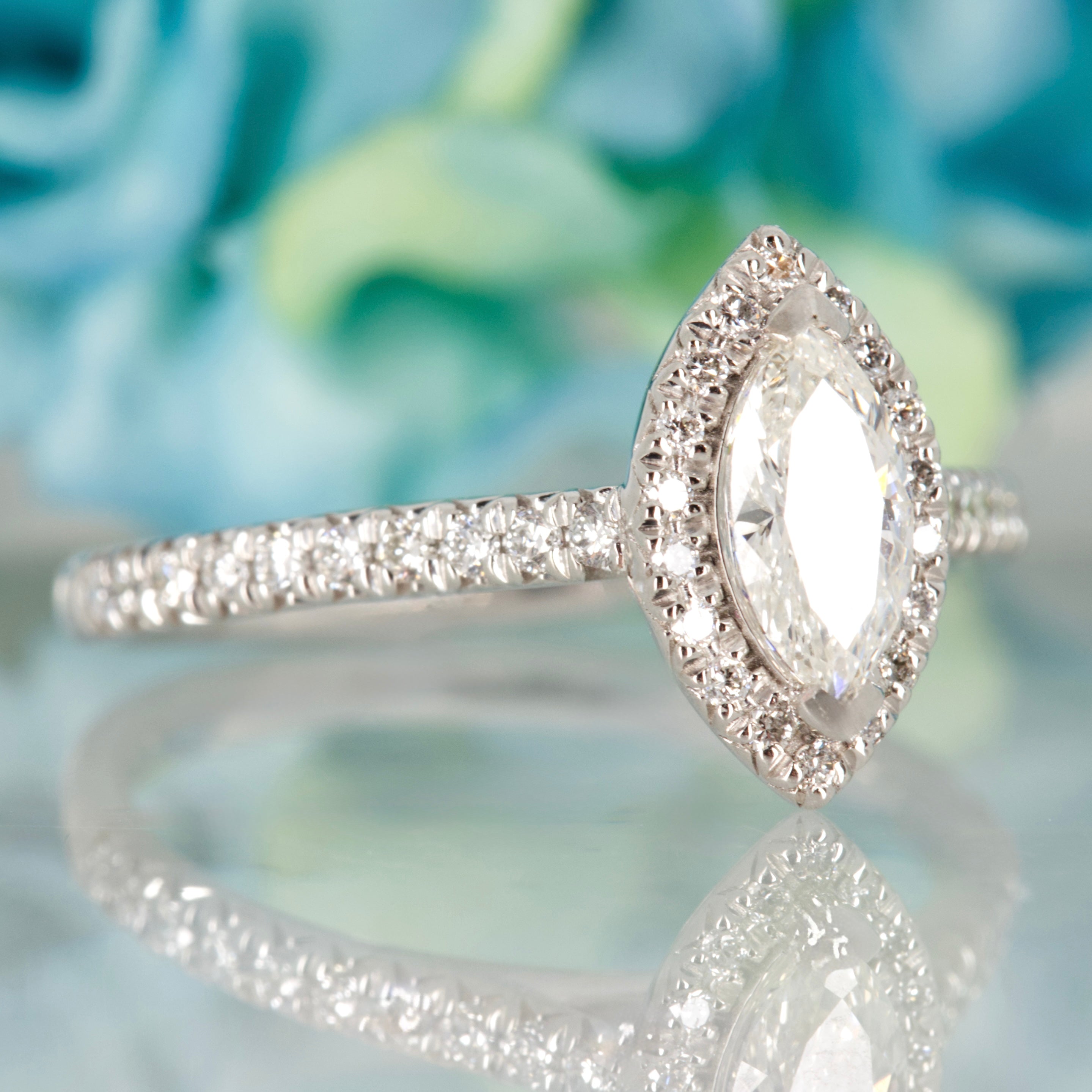Platinum GIA Certified Marquise Cut Diamond & Round Brilliant Cut Diamond Halo Cluster Ring