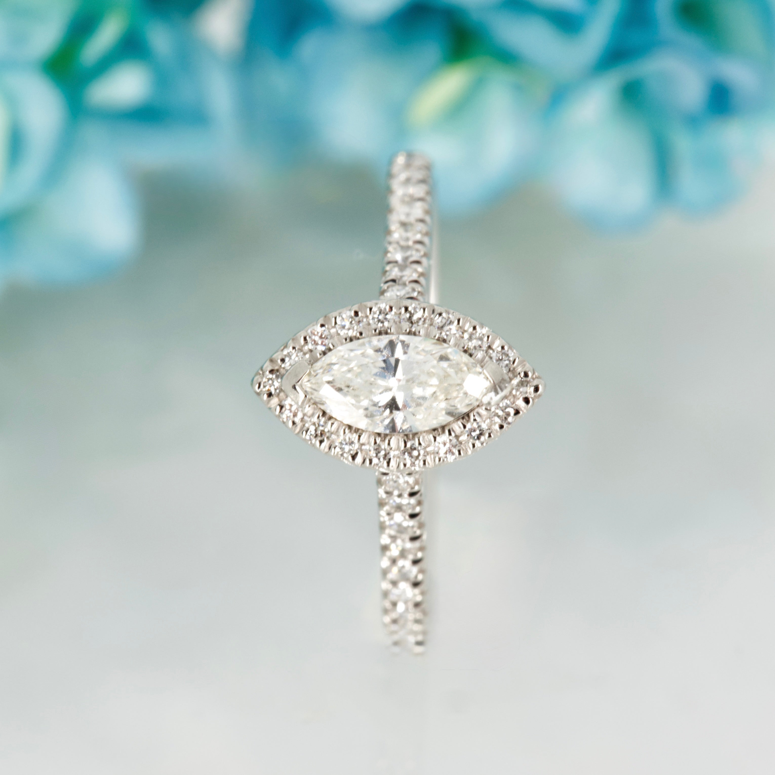 Platinum GIA Certified Marquise Cut Diamond & Round Brilliant Cut Diamond Halo Cluster Ring