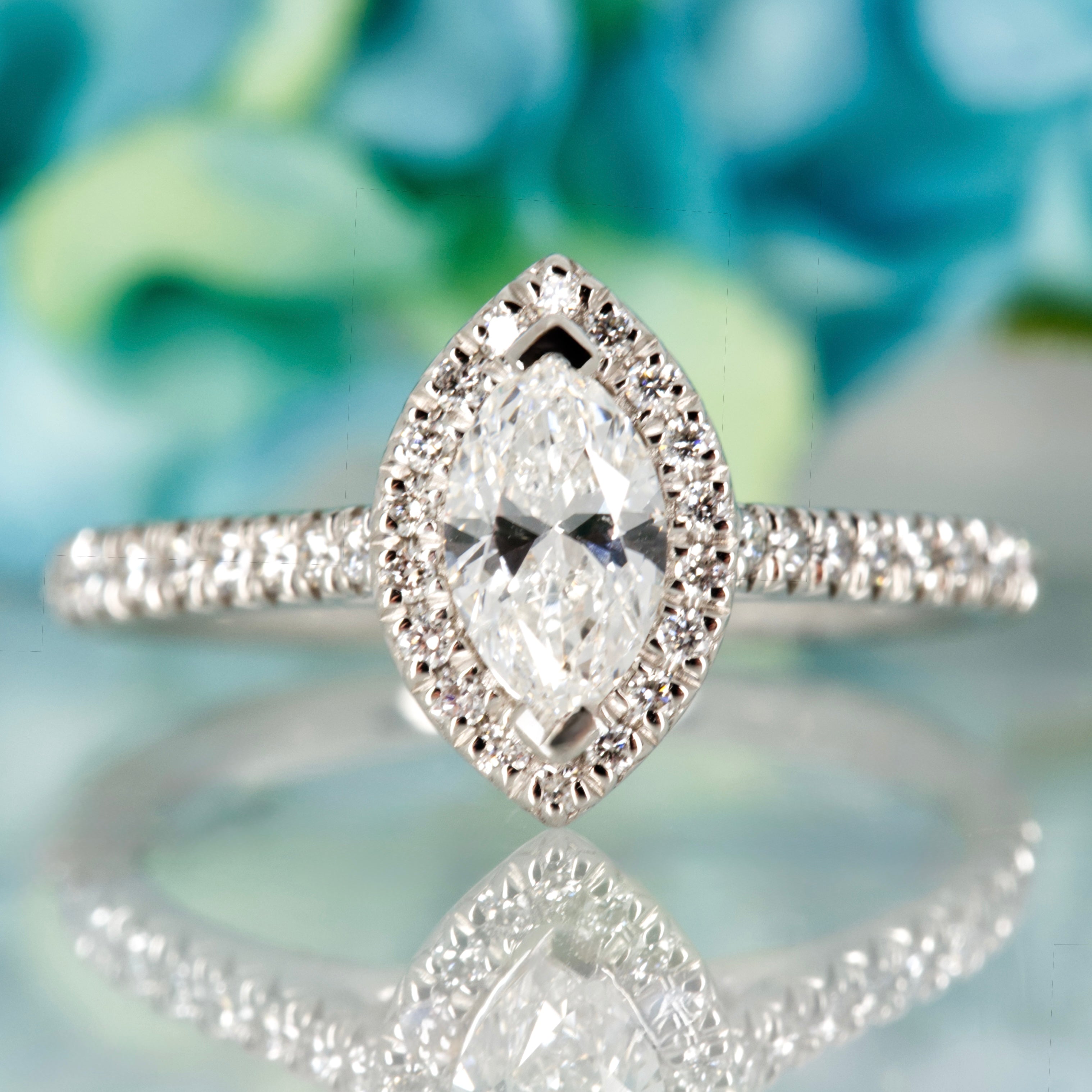 Platinum GIA Certified Marquise Cut Diamond & Round Brilliant Cut Diamond Halo Cluster Ring