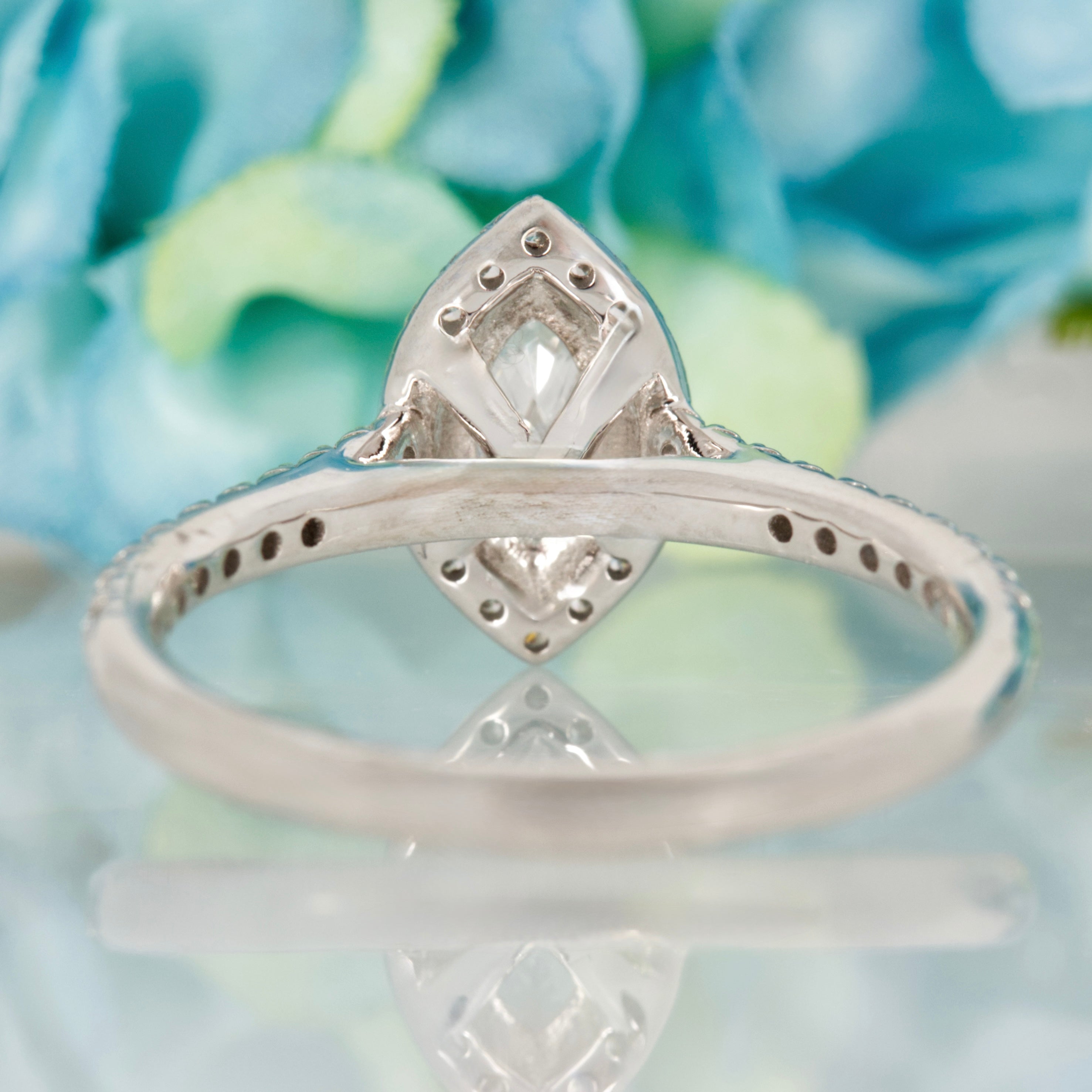 Platinum GIA Certified Marquise Cut Diamond & Round Brilliant Cut Diamond Halo Cluster Ring