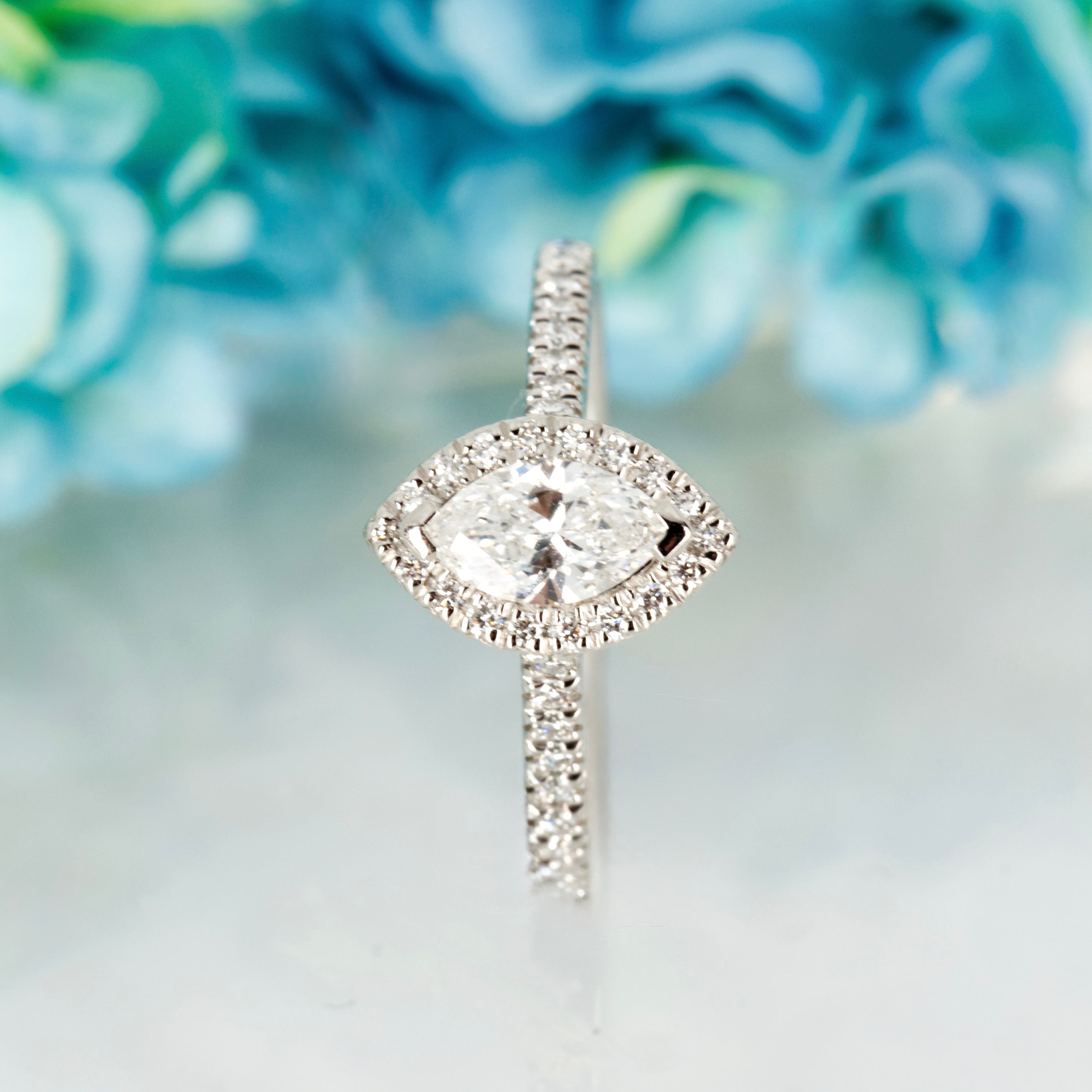 Platinum GIA Certified Marquise Cut Diamond & Round Brilliant Cut Diamond Halo Cluster Ring