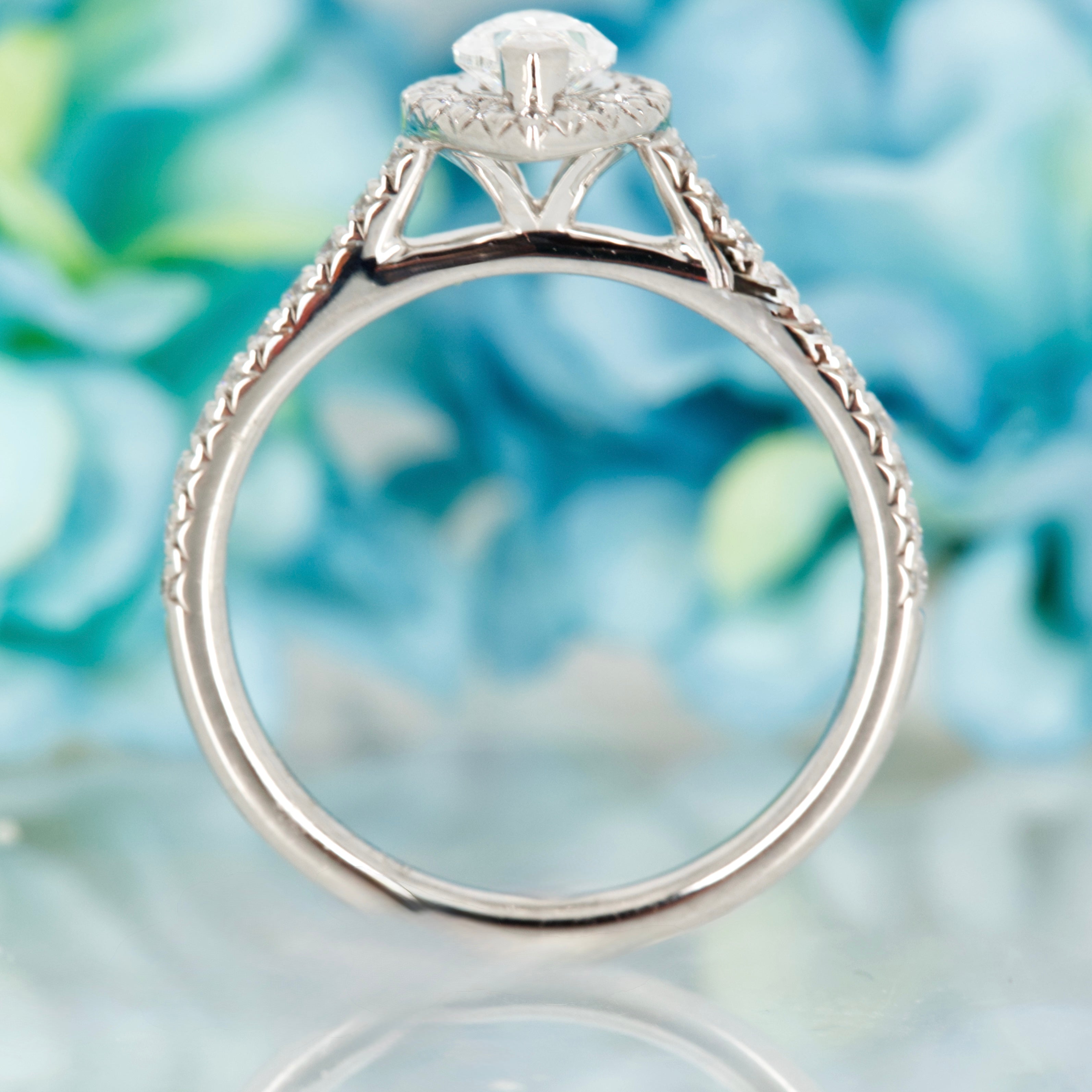 Platinum GIA Certified Marquise Cut Diamond & Round Brilliant Cut Diamond Halo Cluster Ring
