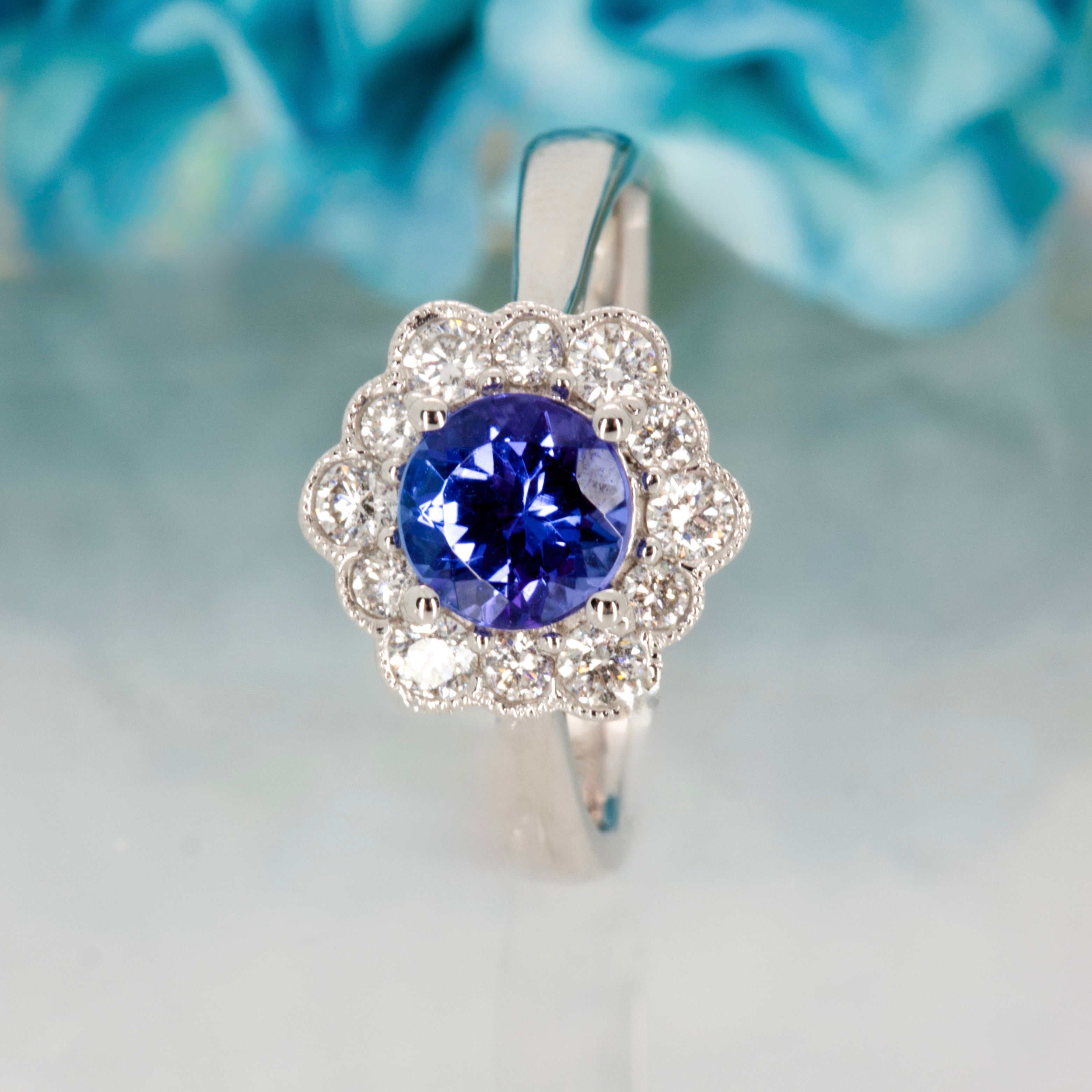 18ct White Gold Round Cut Tanzanite & Round Brilliant Cut Diamond Cluster Ring