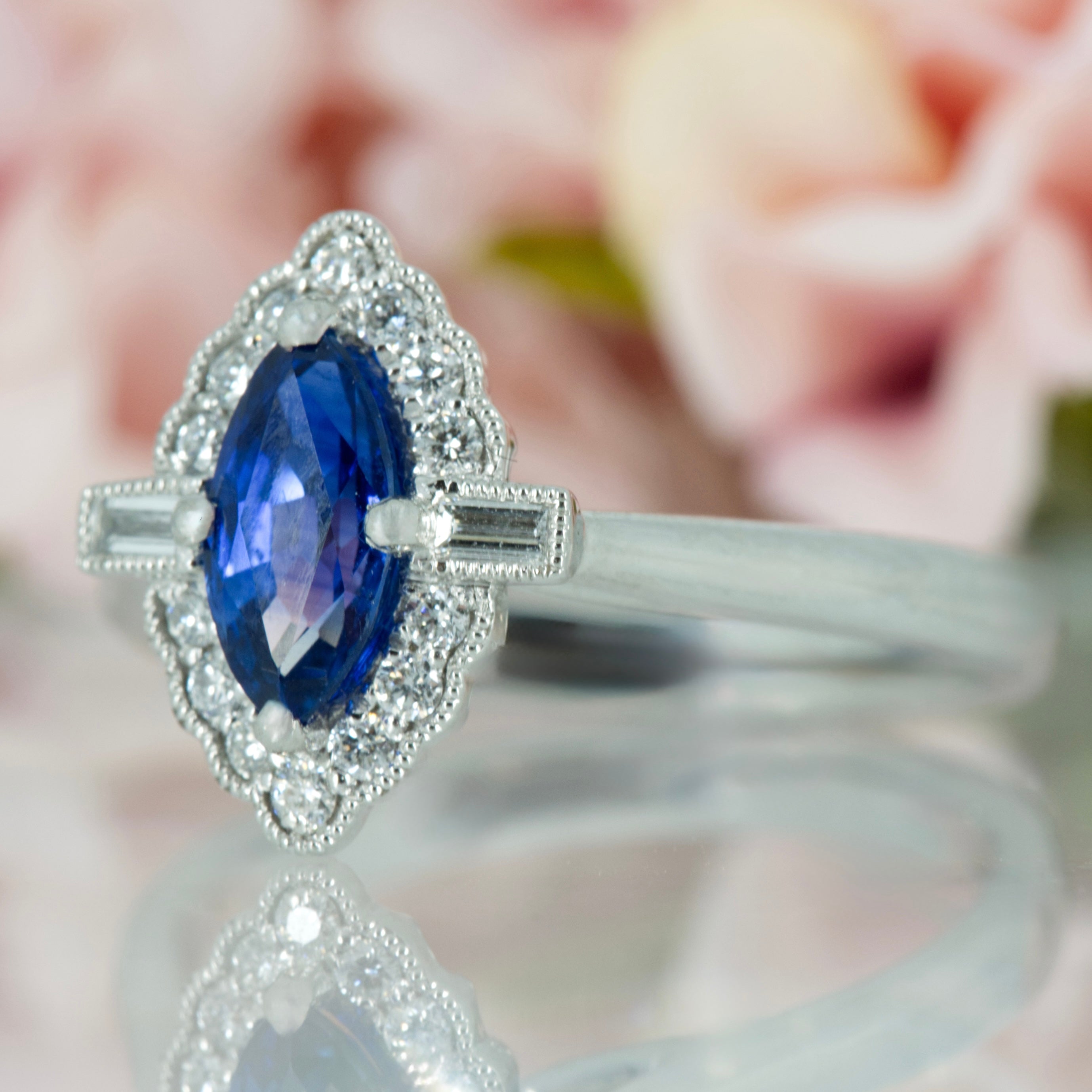 Platinum Marquise Cut Sapphire & Baguette and Round Brilliant Cut Diamond Cluster Ring