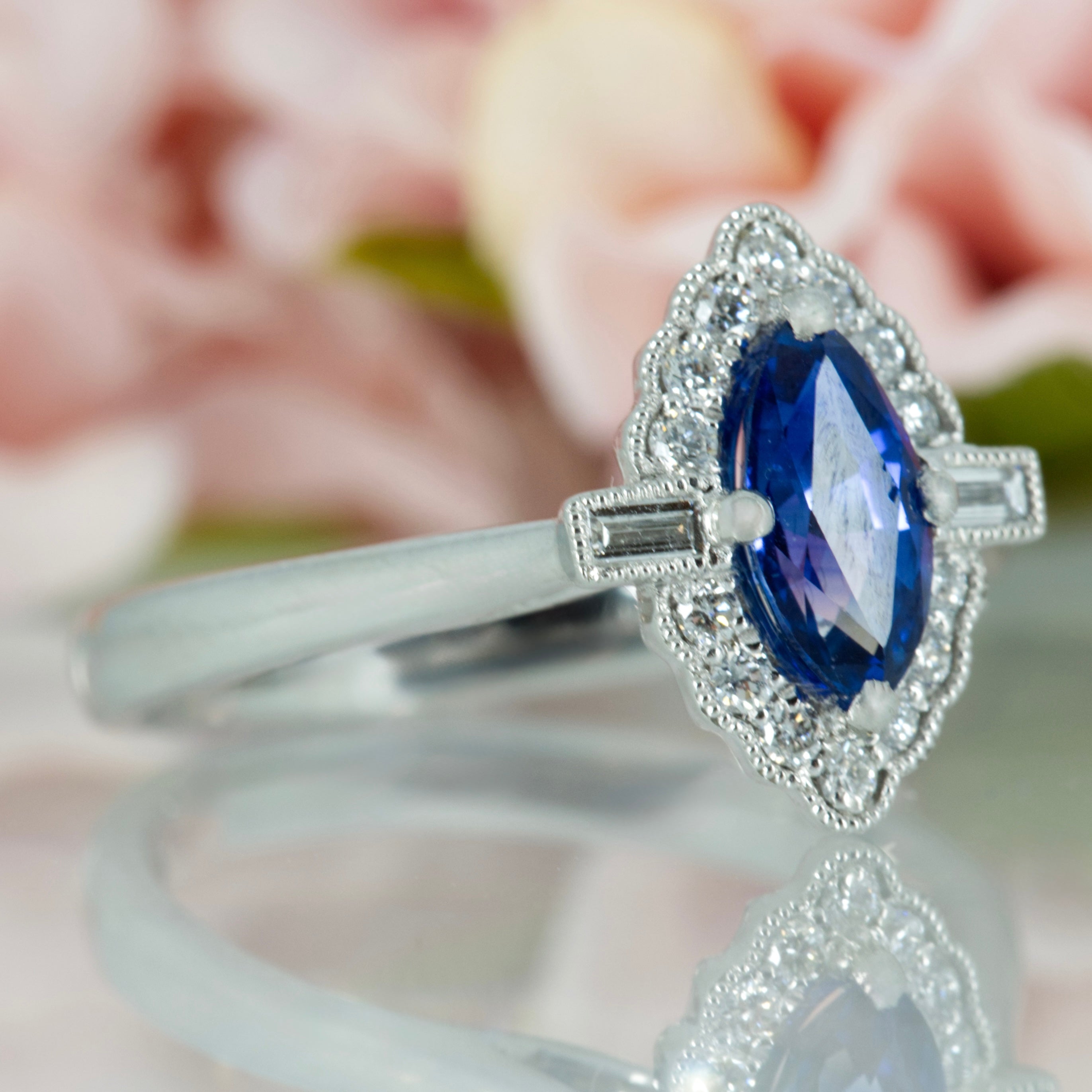 Platinum Marquise Cut Sapphire & Baguette and Round Brilliant Cut Diamond Cluster Ring