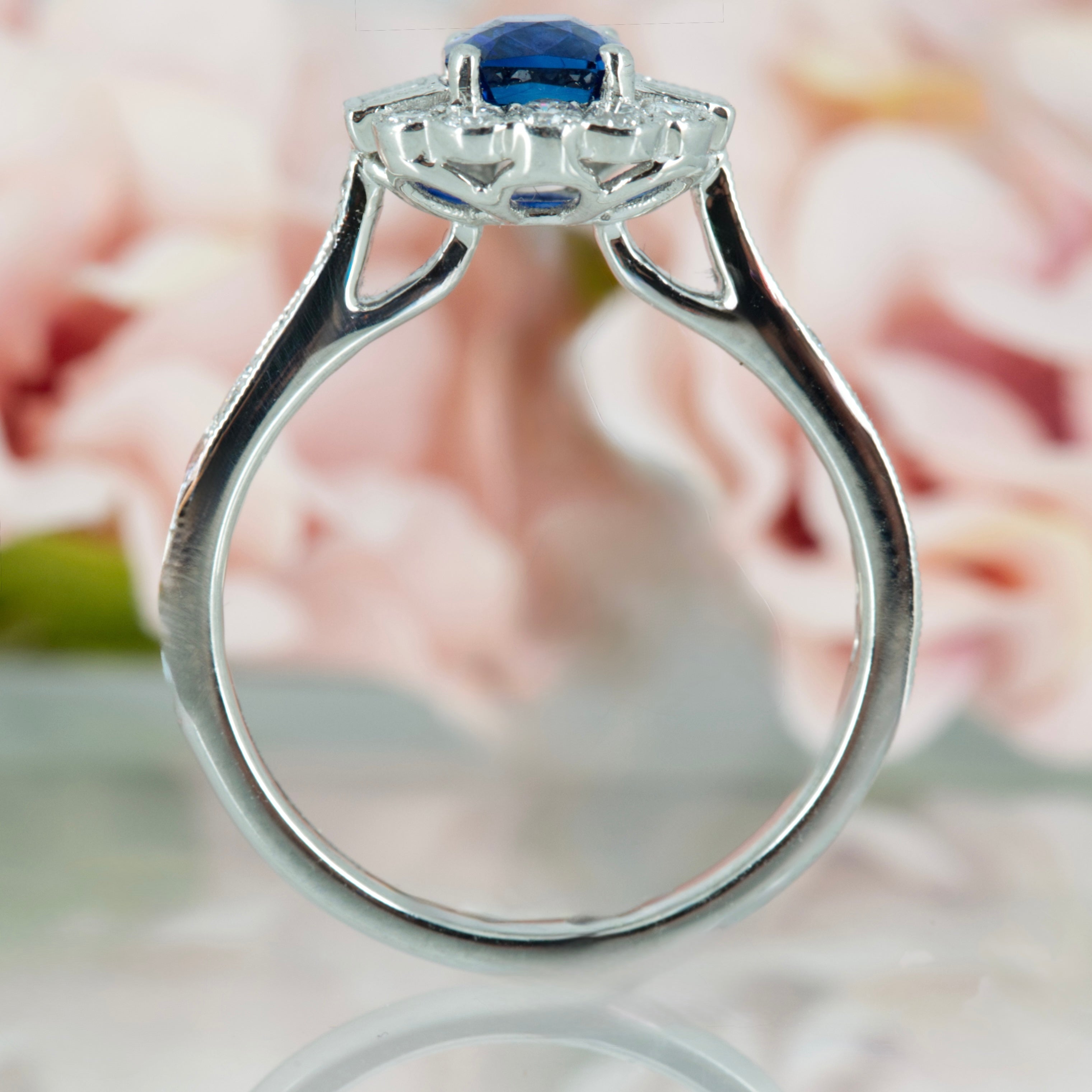 Platinum Octagonal Cut Sapphire & Baguette and Round Brilliant Cut Diamond Cluster Ring