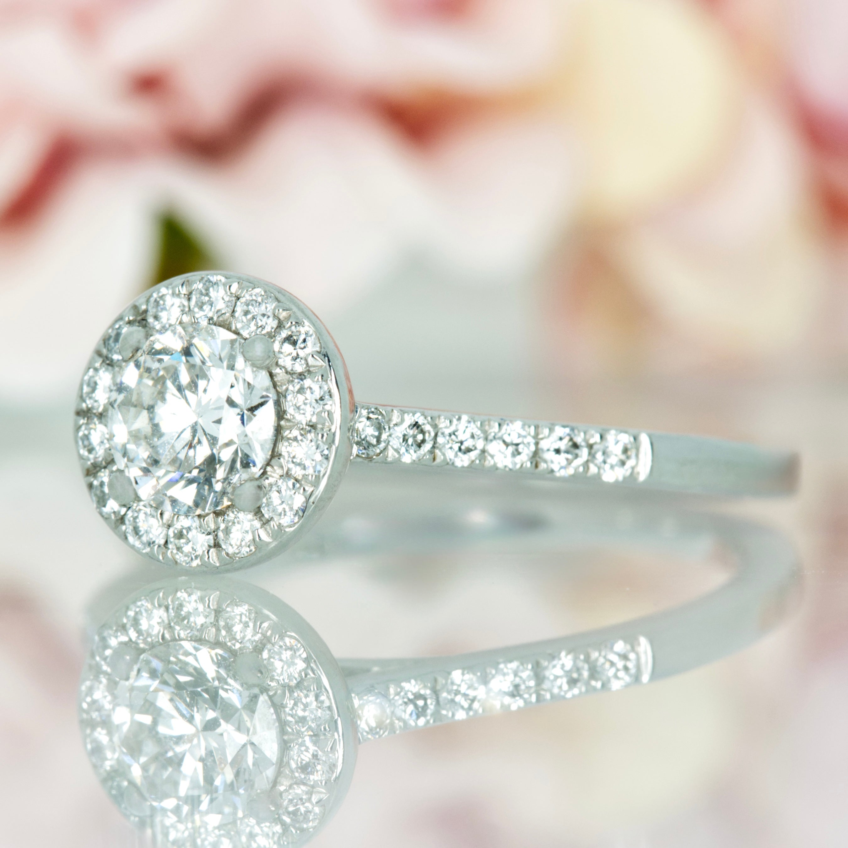 Platinum Certifed 0.79ct Round Brilliant Cut Diamond Halo Cluster Ring