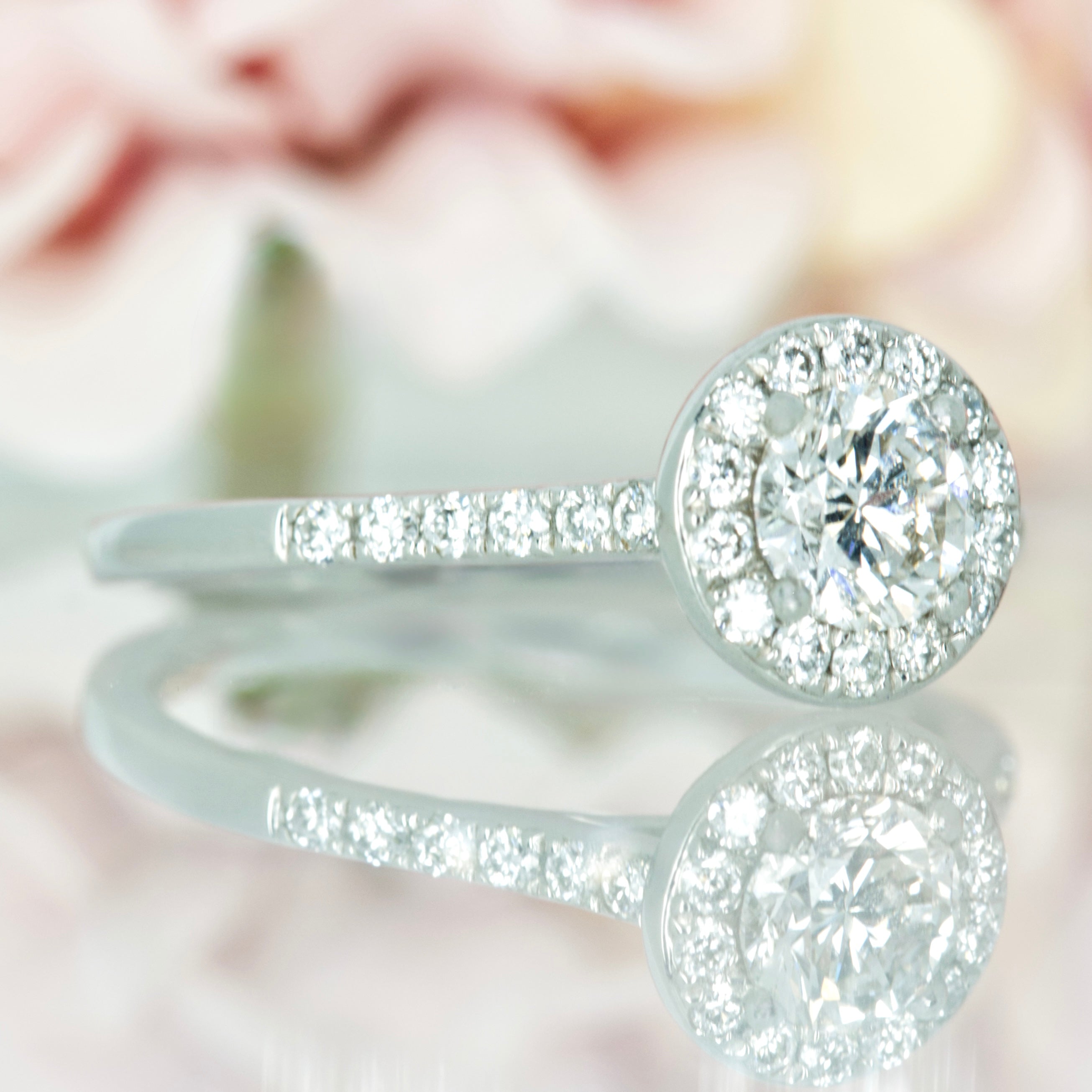 Platinum Certifed 0.79ct Round Brilliant Cut Diamond Halo Cluster Ring
