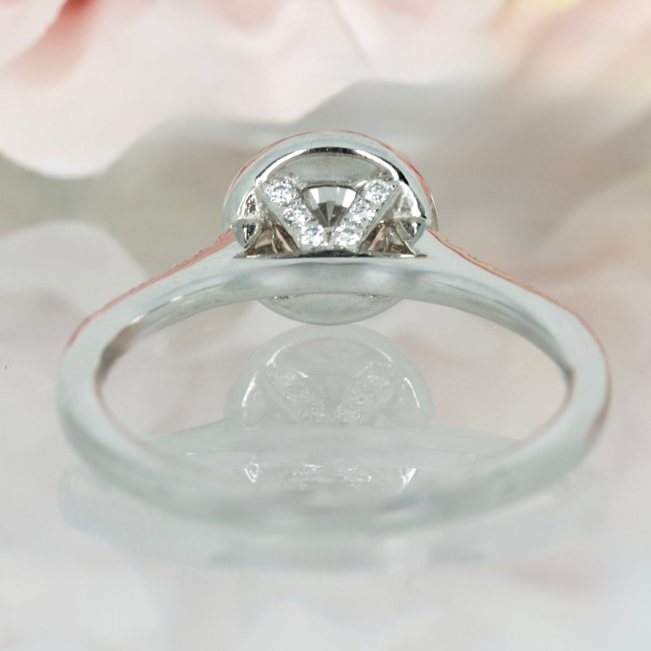 Platinum Certifed 0.79ct Round Brilliant Cut Diamond Halo Cluster Ring
