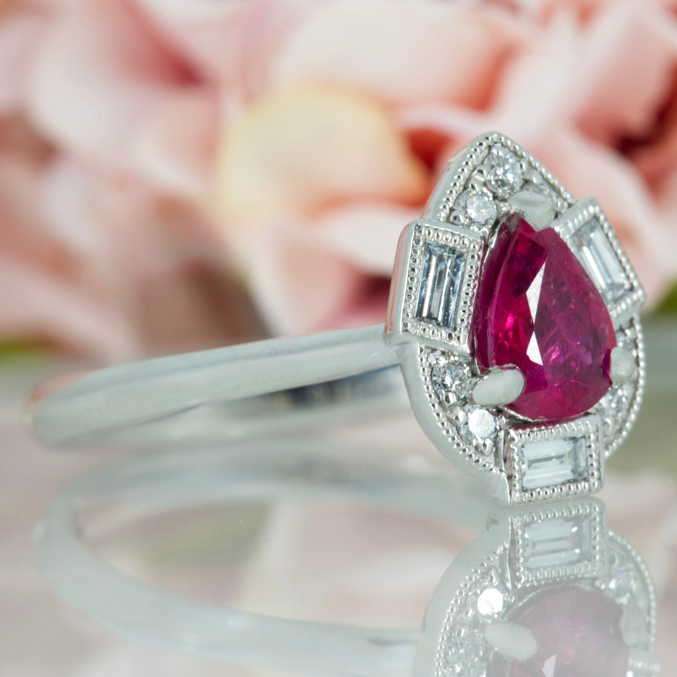 Platinum Pear Cut Ruby & Baguette and Round Brilliant Cut Diamond Cluster Ring