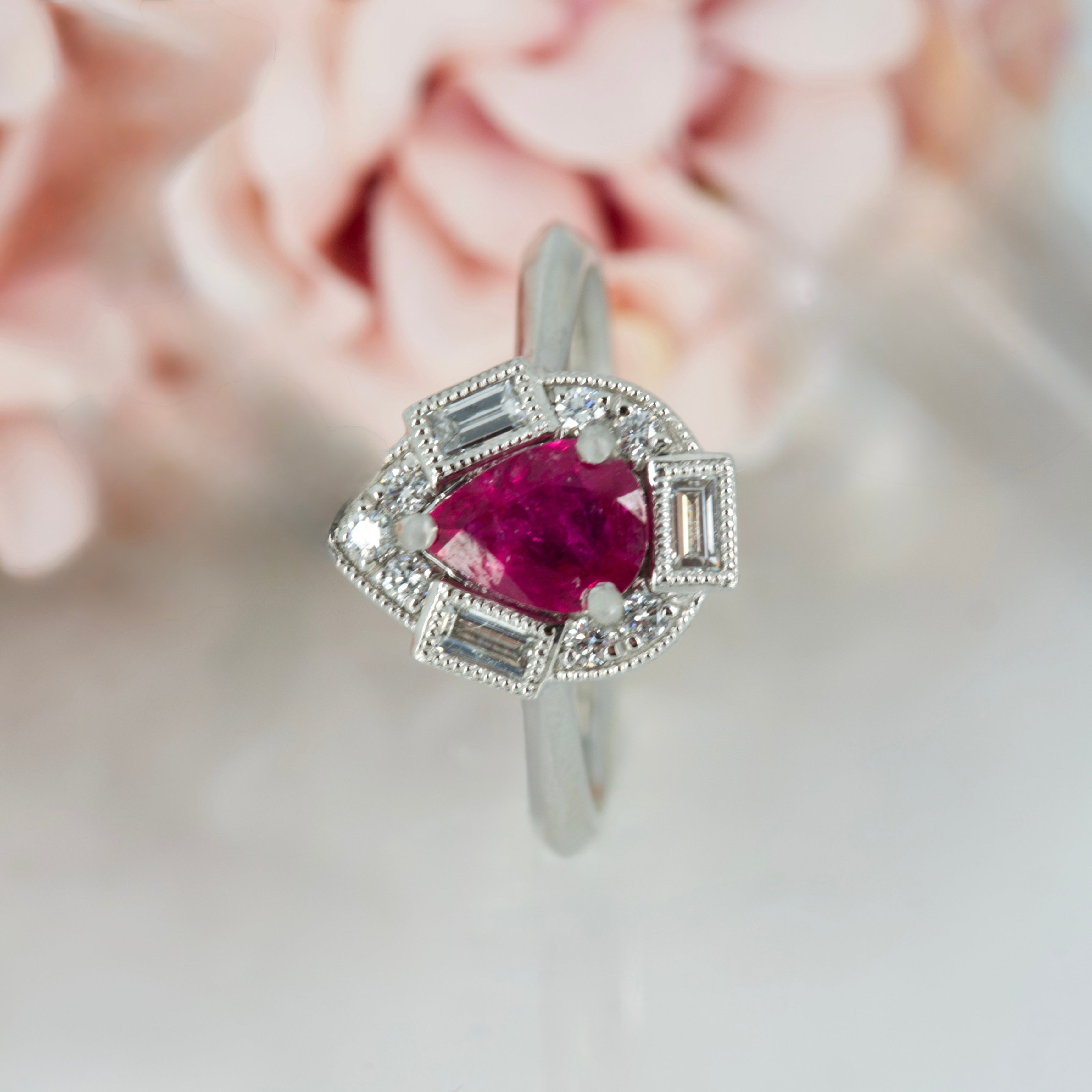 Platinum Pear Cut Ruby & Baguette and Round Brilliant Cut Diamond Cluster Ring