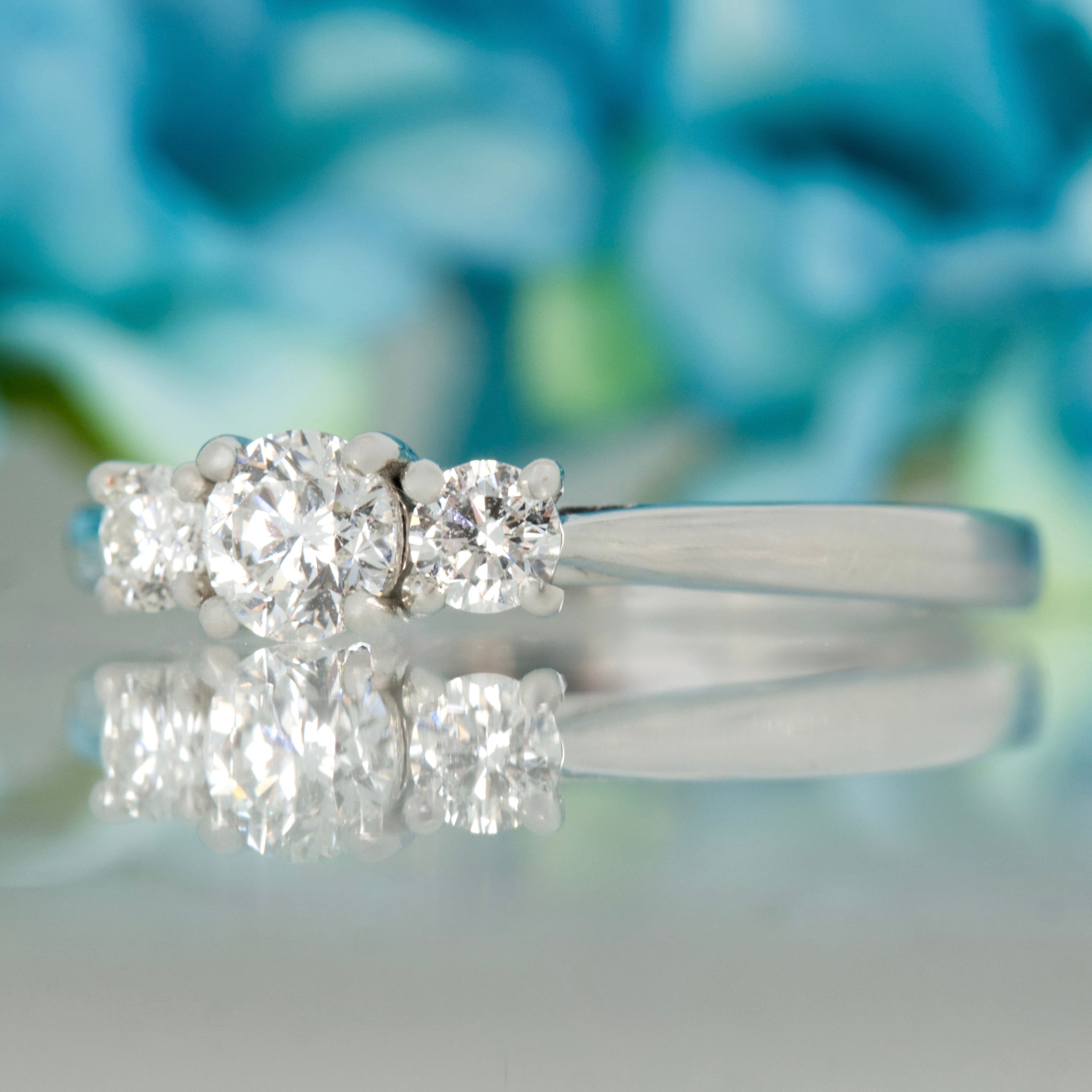 Platinum 0.50ct Round Brilliant Cut Diamond Claw Set Trilogy Ring