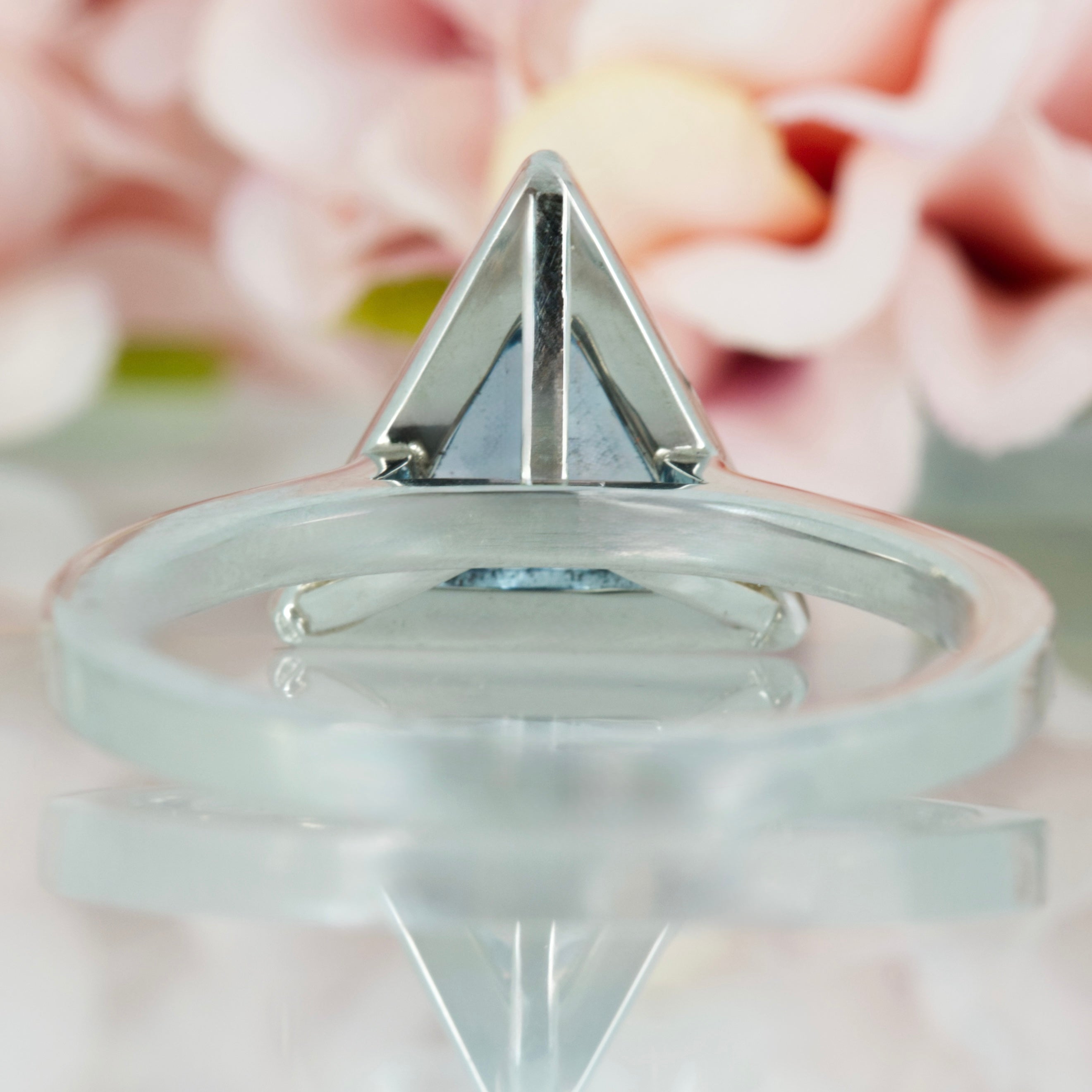 Platinum Trilliant Cut Aquamarine & Round Brilliant Cut Diamond Halo Cluster Ring