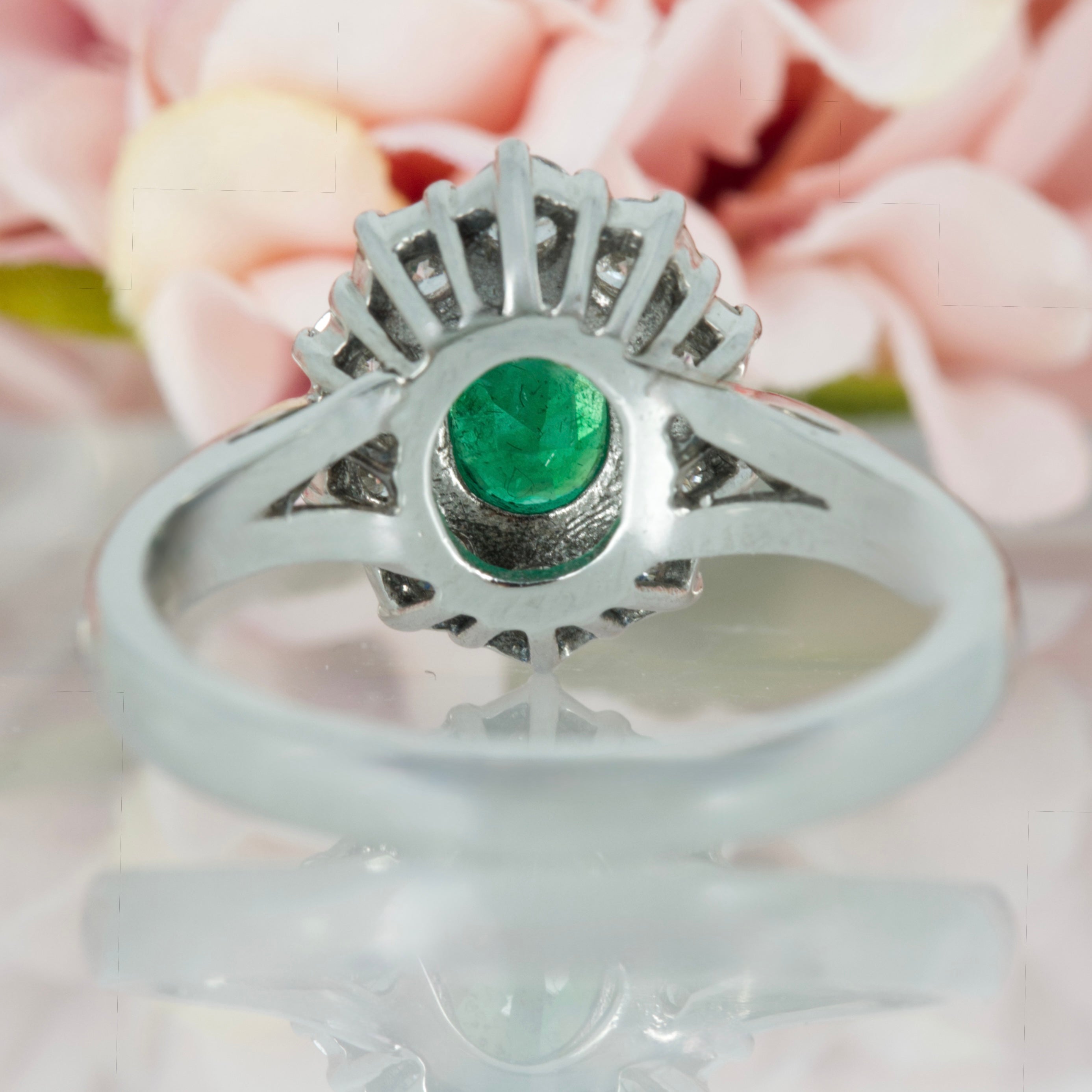 Platinum Oval Cut Emerald & Round Brilliant Cut Diamond Cluster Ring