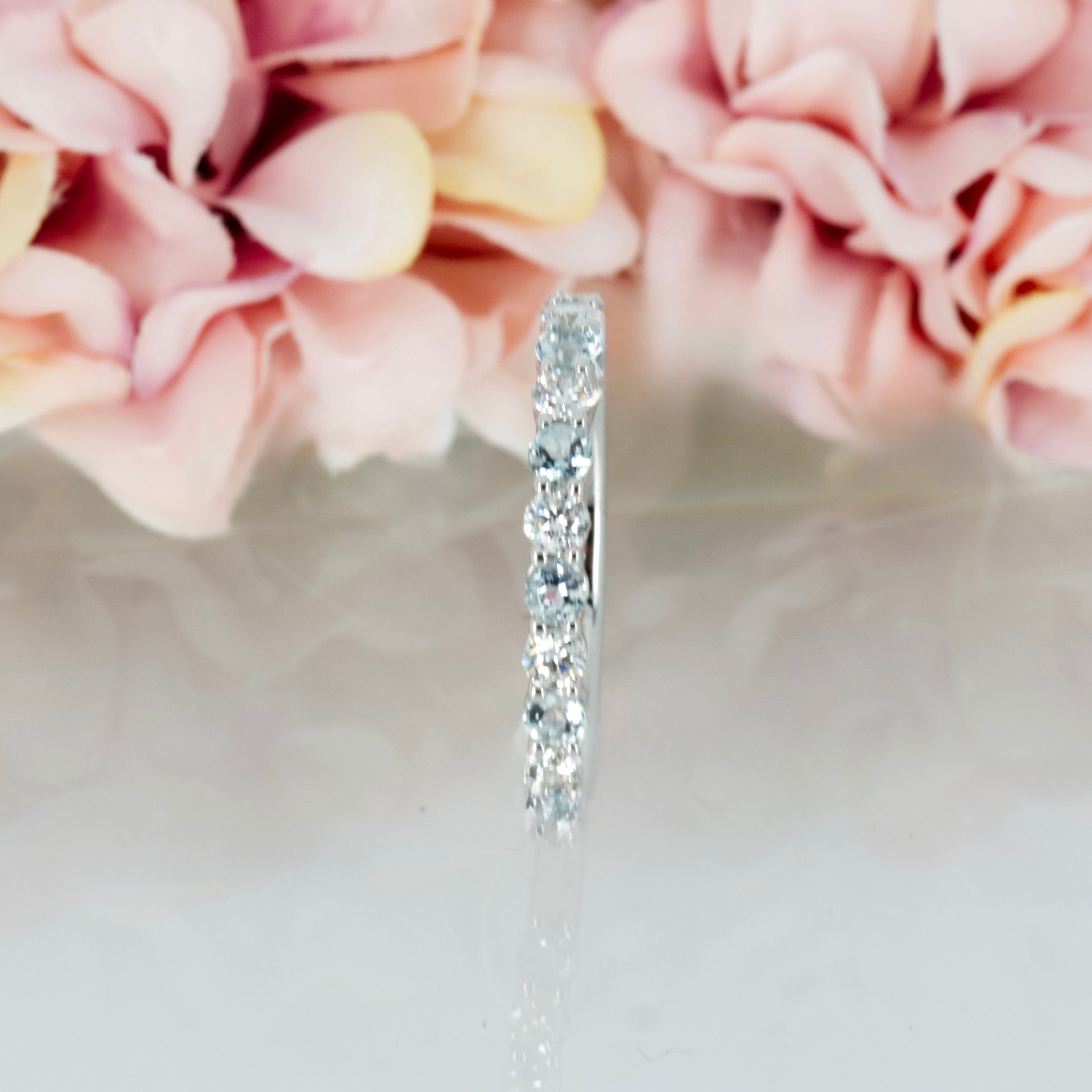 Platinum Round Cut Aquamarine & Round Brilliant Cut Diamond Claw Set Half Eternity Ring