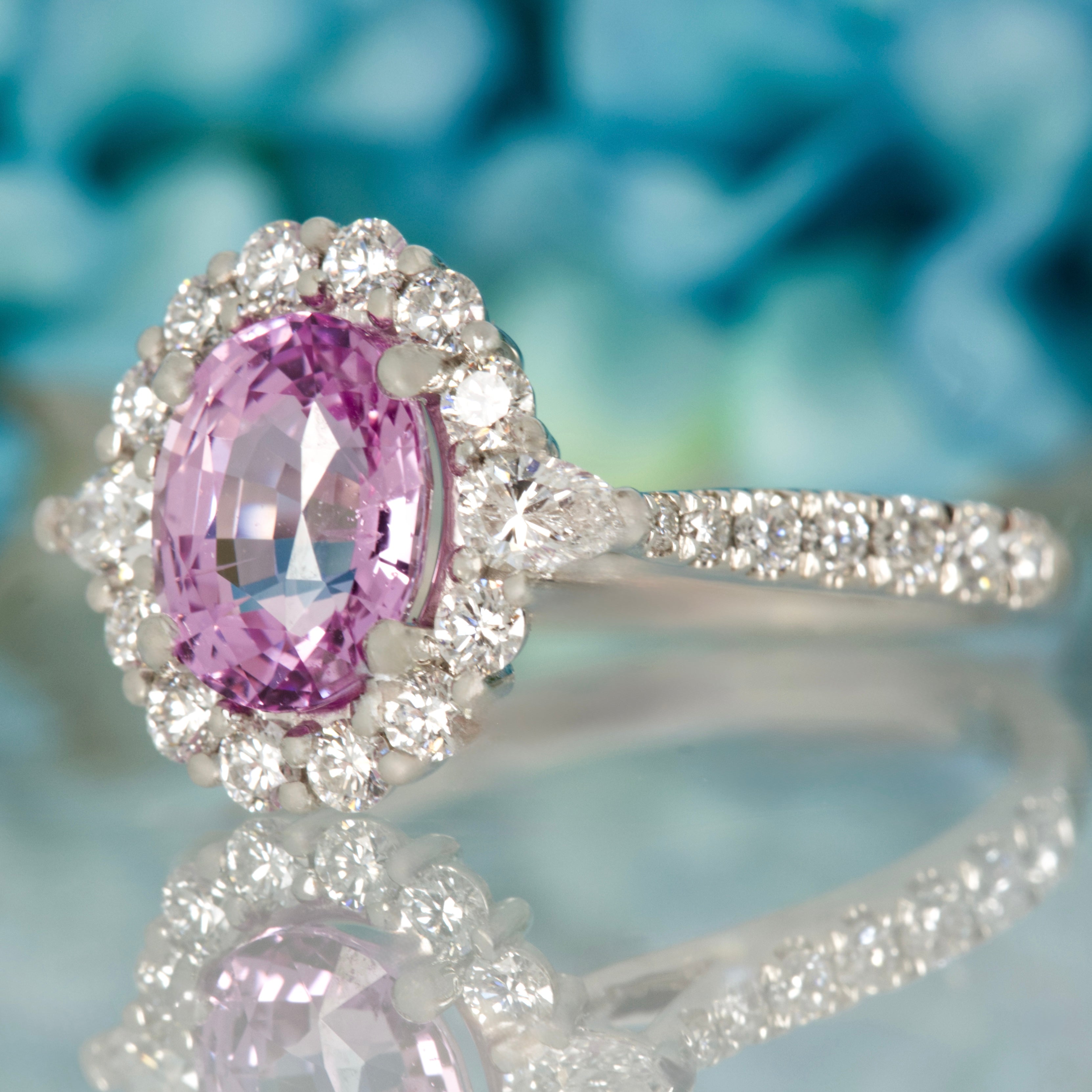 Platinum Oval Cut Pink Sapphire & Pear and Round Brilliant Cut Diamond Cluster Ring