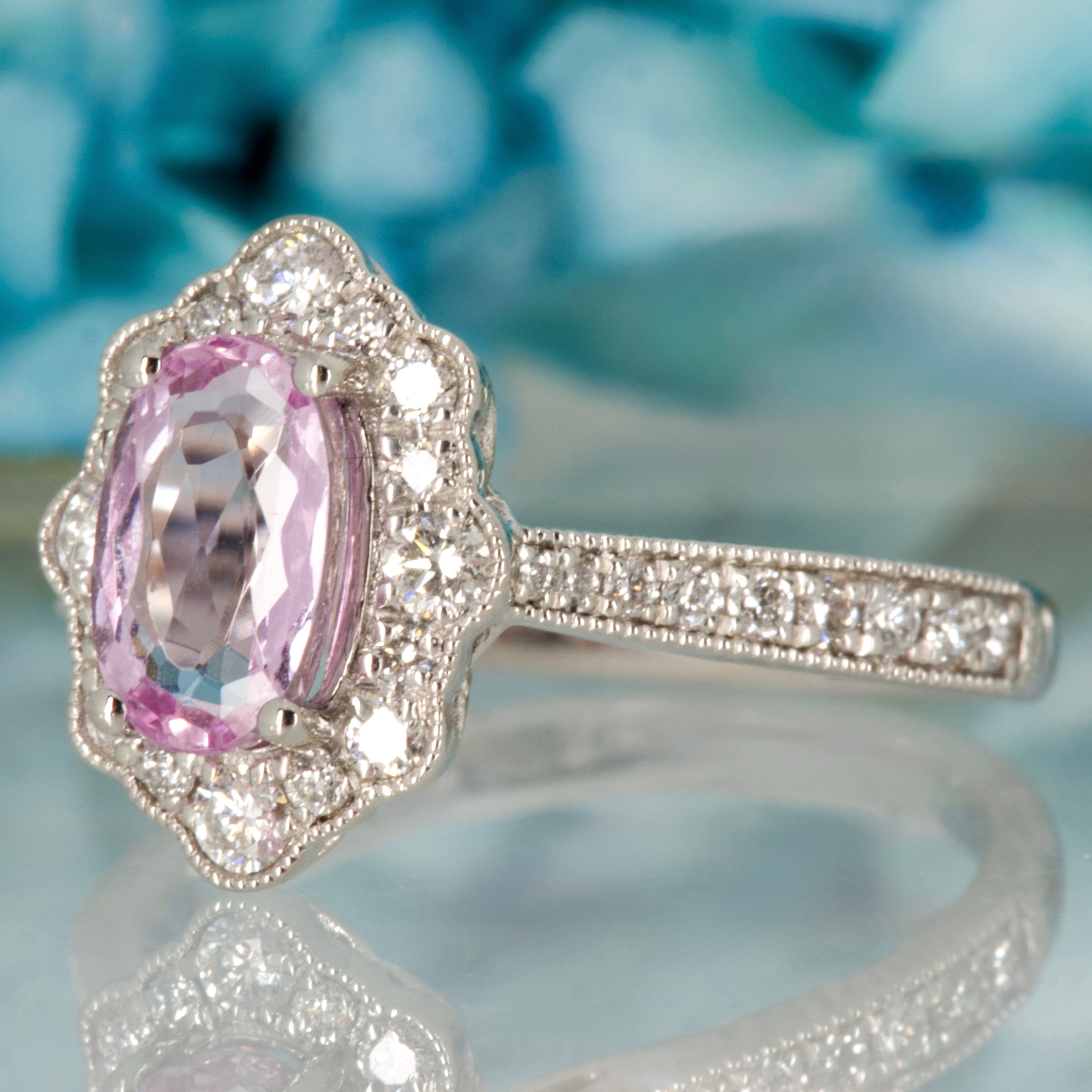 Platinum Oval Cut Pink Topaz & Round Brilliant Cut Diamond Cluster Ring
