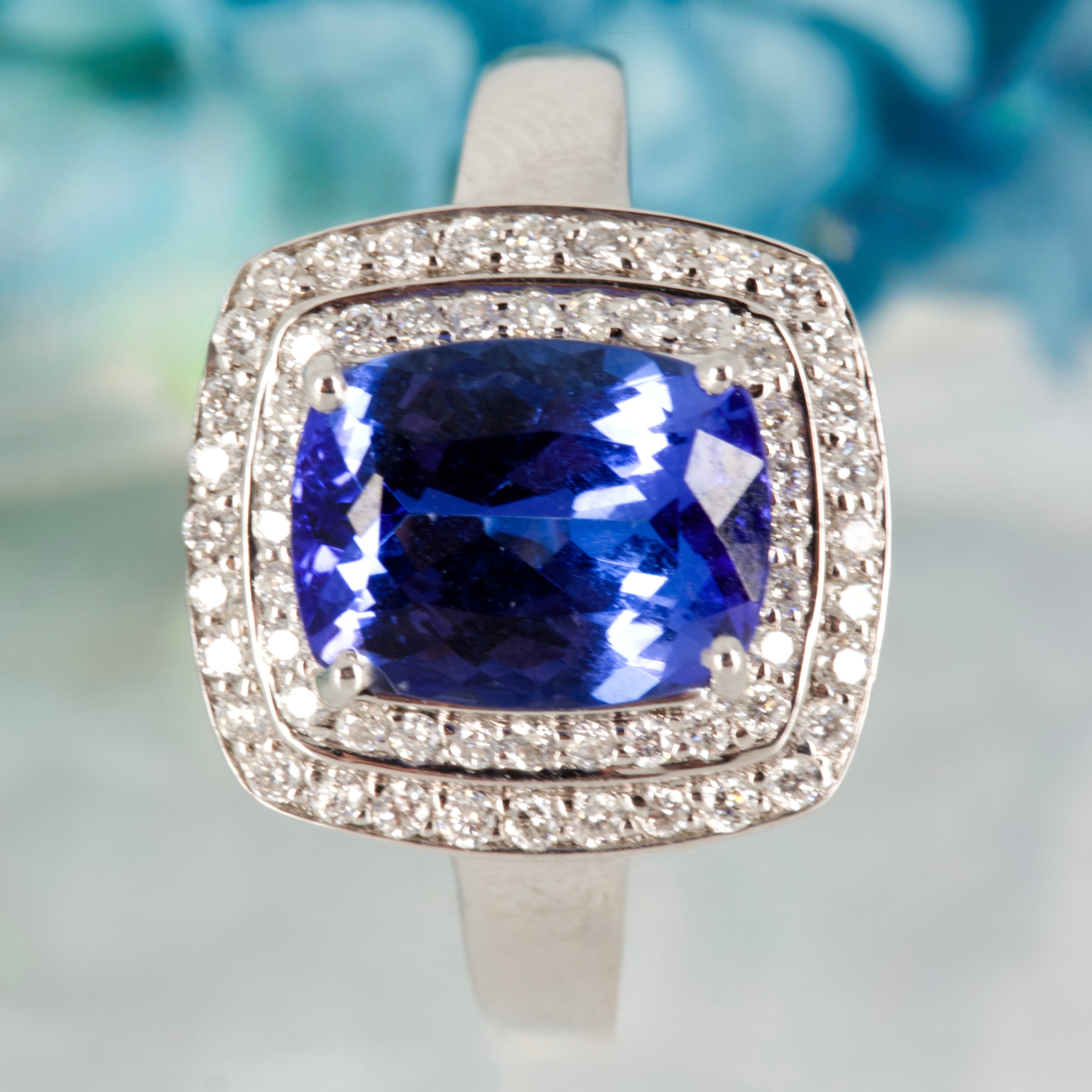 Pre-Loved 18ct White Gold Cushion Cut Tanzanite & Round Brilliant Cut Diamond Double Halo Cluster Ring