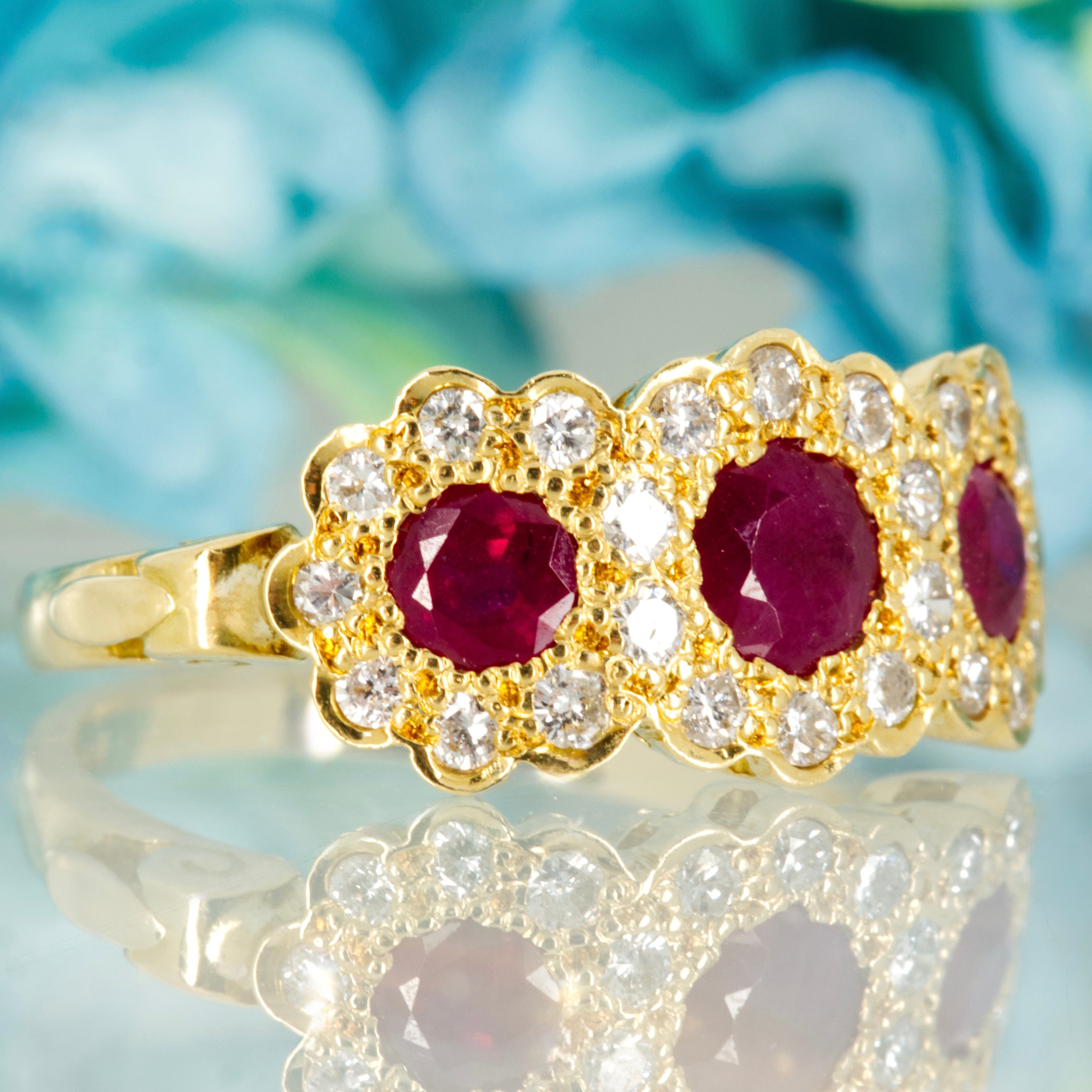 Pre-Loved 18ct Yellow Gold Round Cut Ruby & Round Brilliant Cut Diamond Triple Cluster Ring