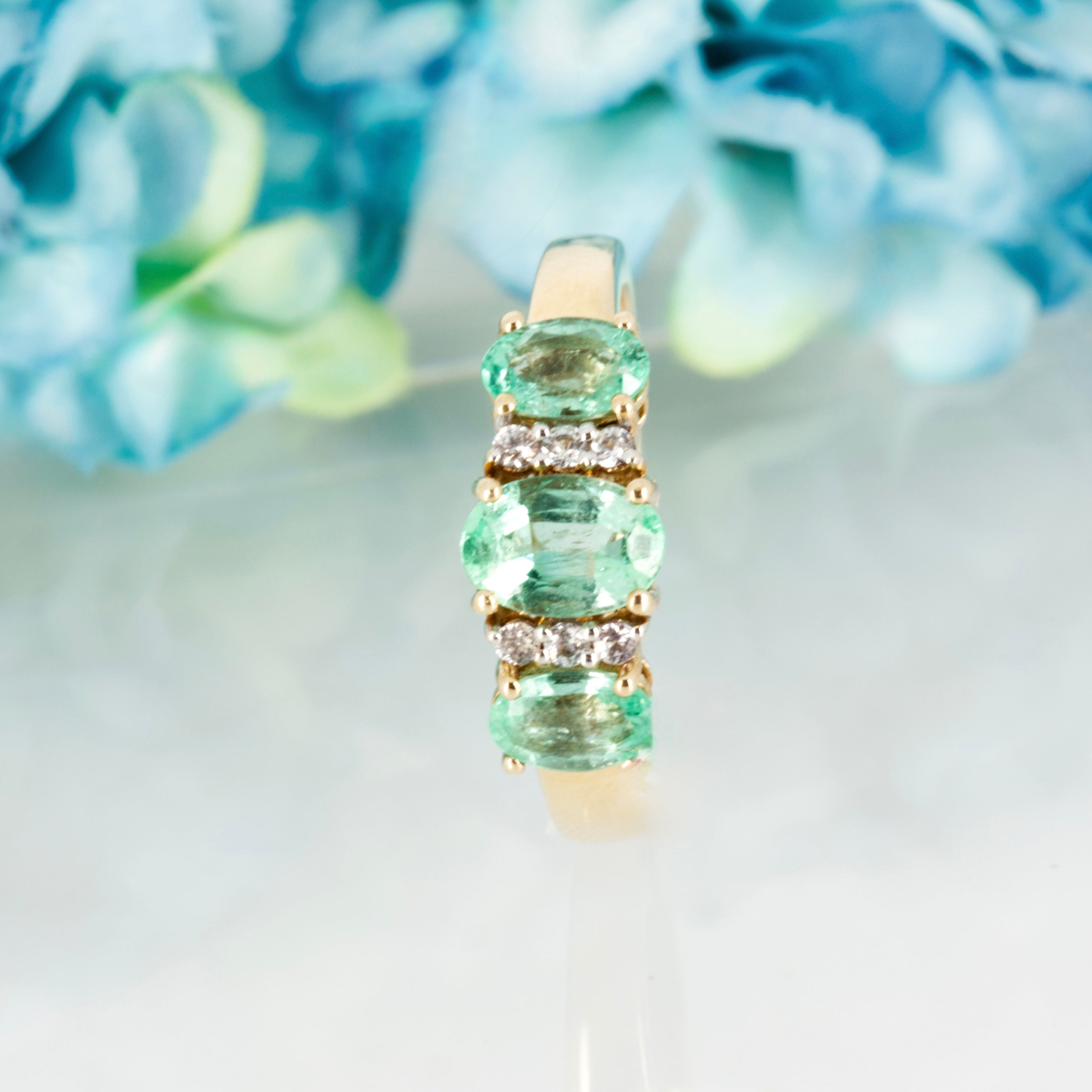 Pre-Loved 9ct Yellow Gold Oval Cut Emerald & Round Cut White Stone Dress Ring