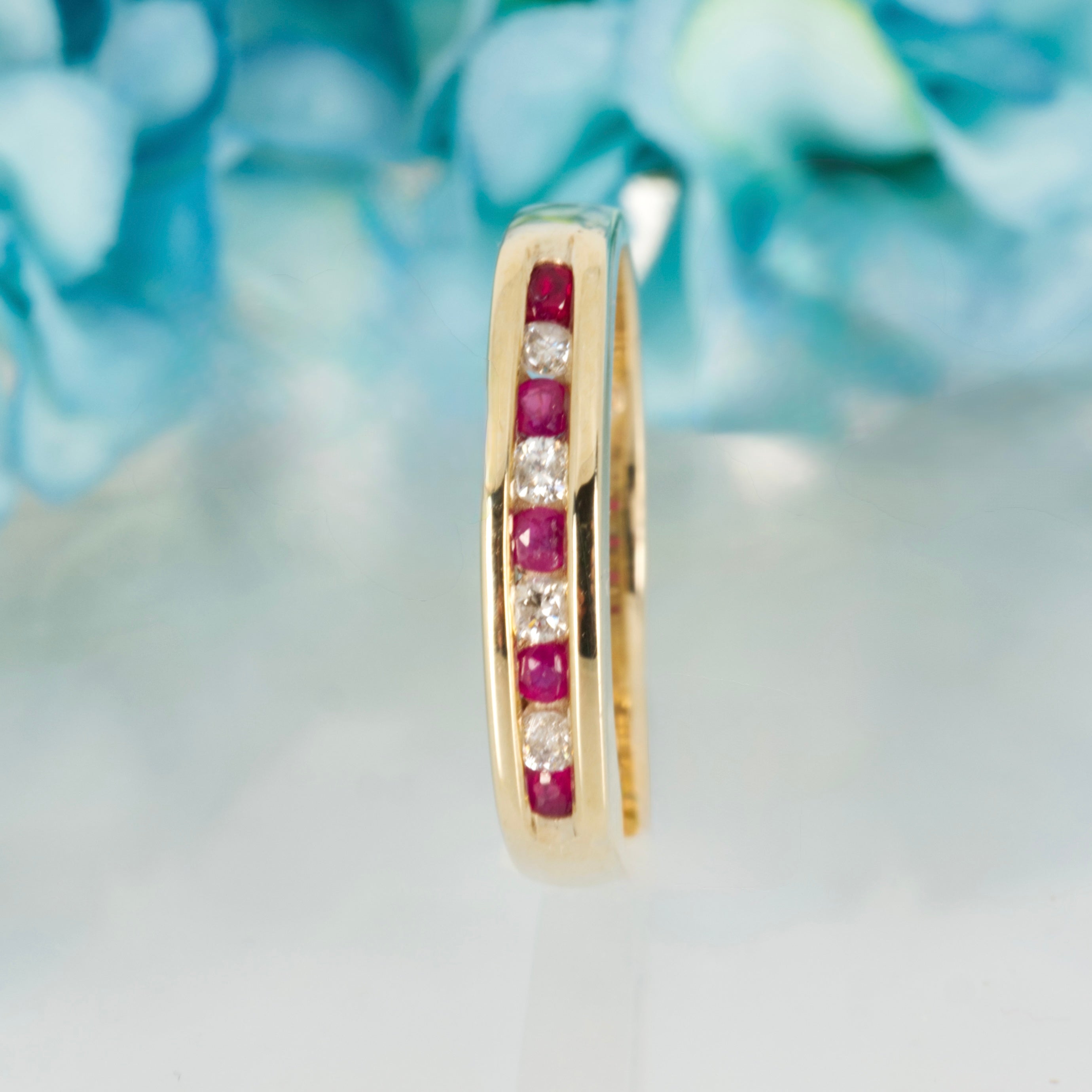 Pre-Loved 9ct Yellow Gold Round Cut Ruby & Round Brilliant Cut Diamond Channel Set Half Eternity Ring
