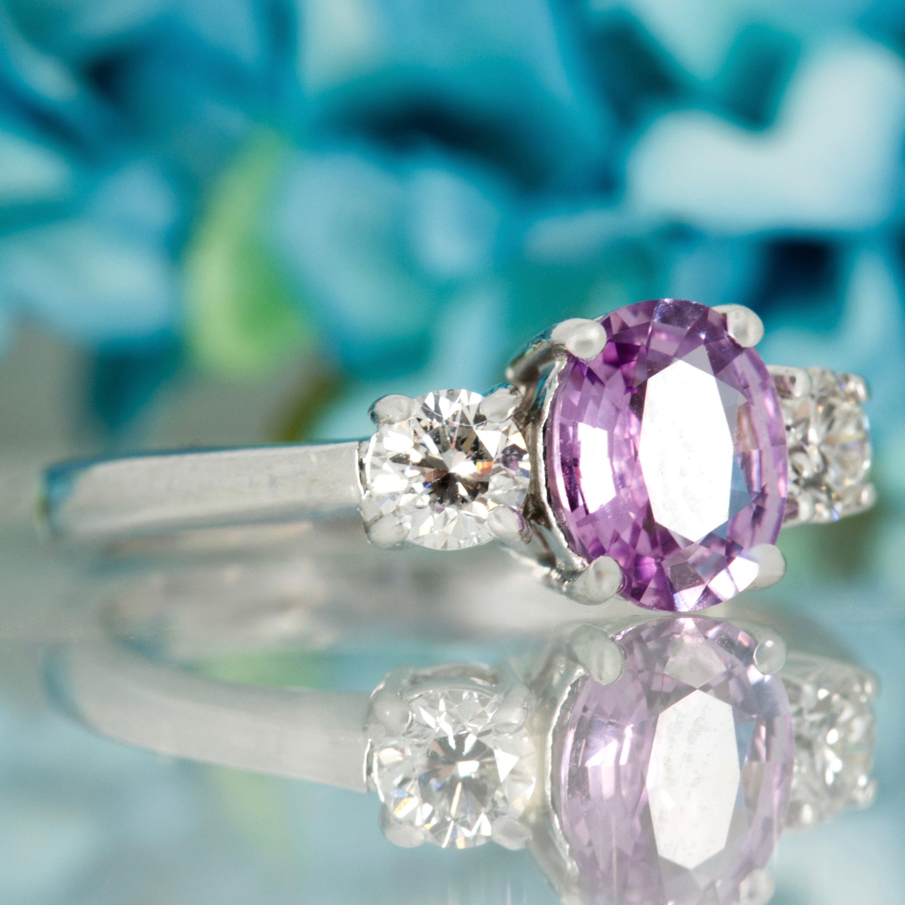 Pre-Loved 18ct White Gold Oval Cut Lilac Sapphire & Round Brilliant Cut Diamond Trilogy Ring
