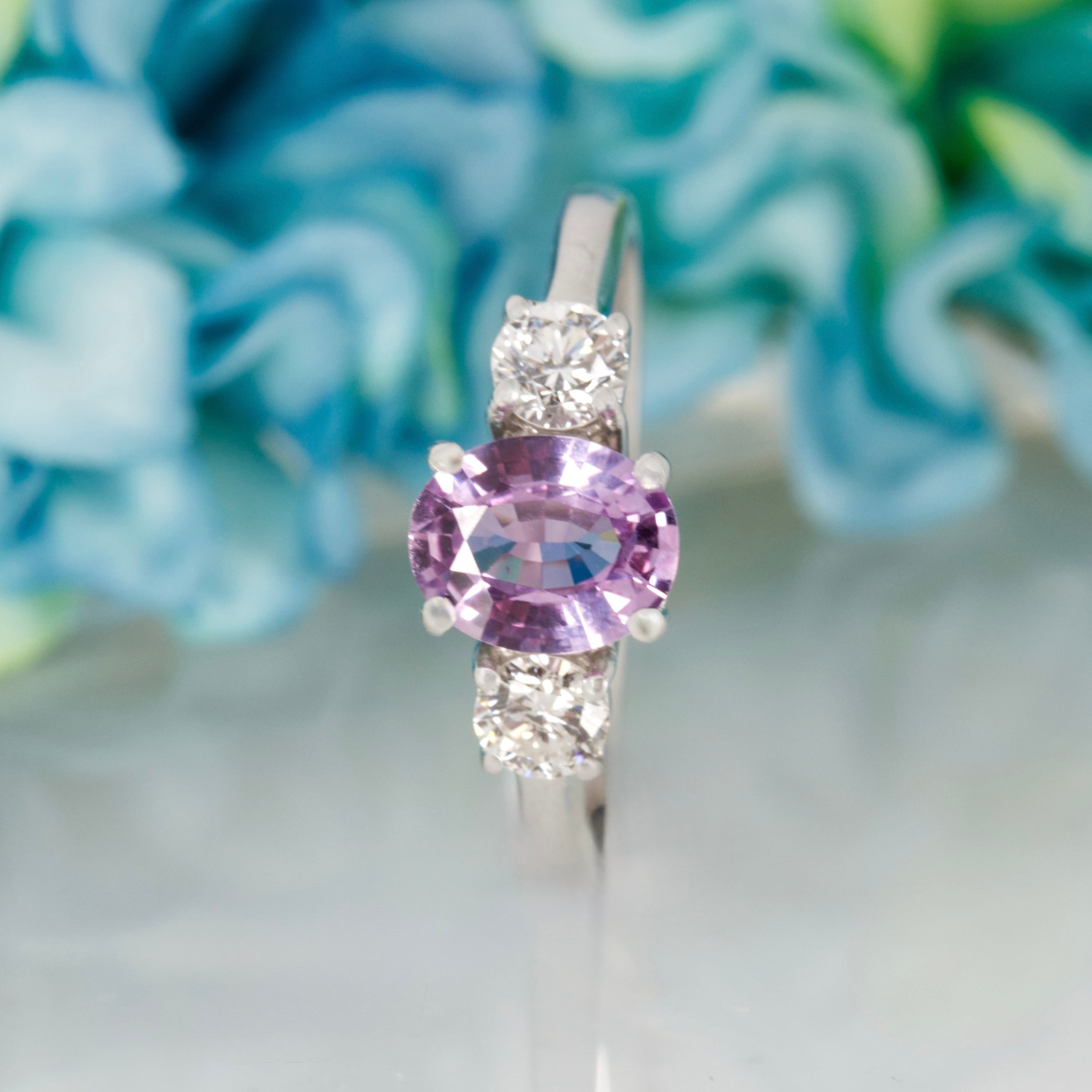 Pre-Loved 18ct White Gold Oval Cut Lilac Sapphire & Round Brilliant Cut Diamond Trilogy Ring