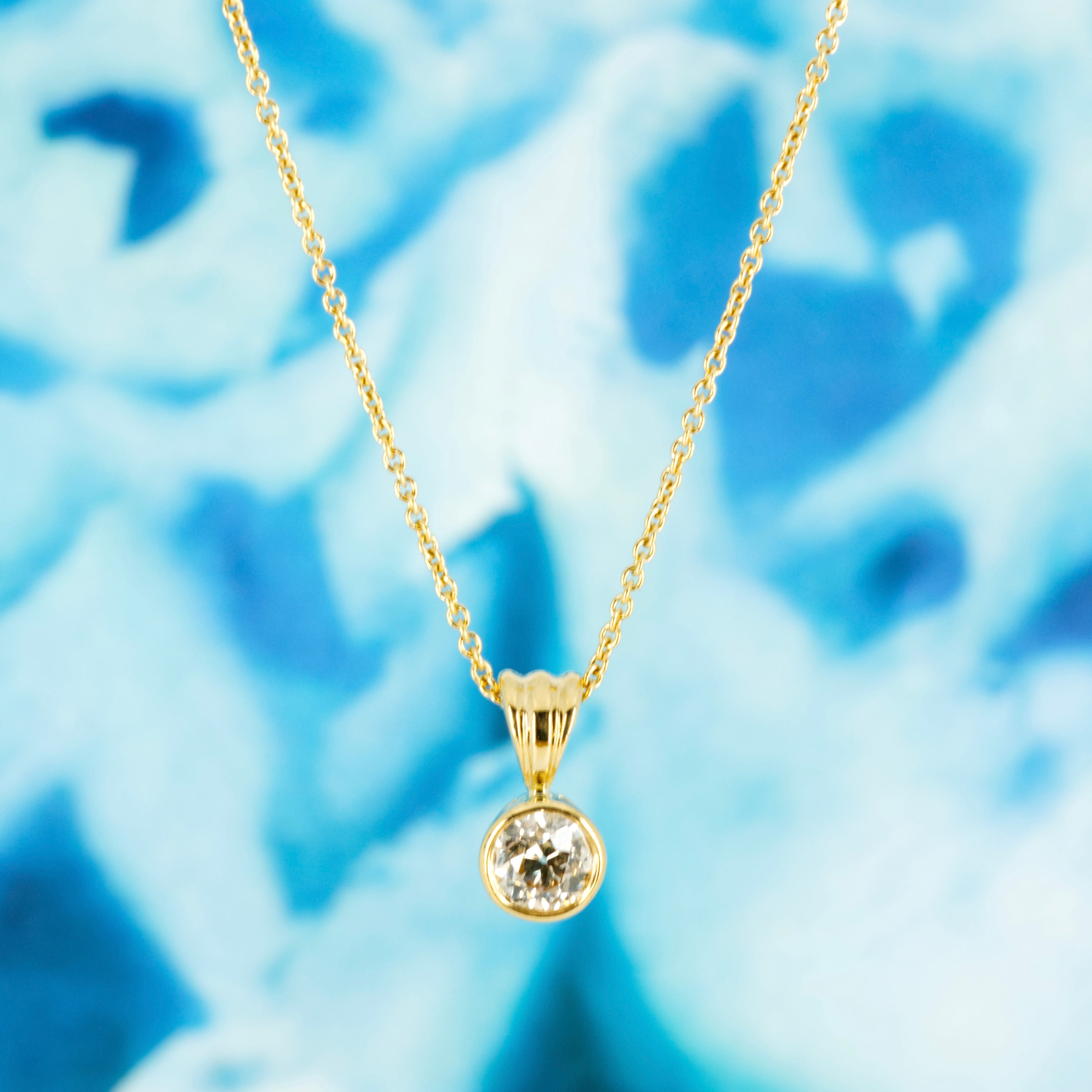 Pre-Loved 18ct Yellow Gold 0.51ct Round Brilliant Cut Diamond Solitaire Rub-Over Set Pendant & Chain
