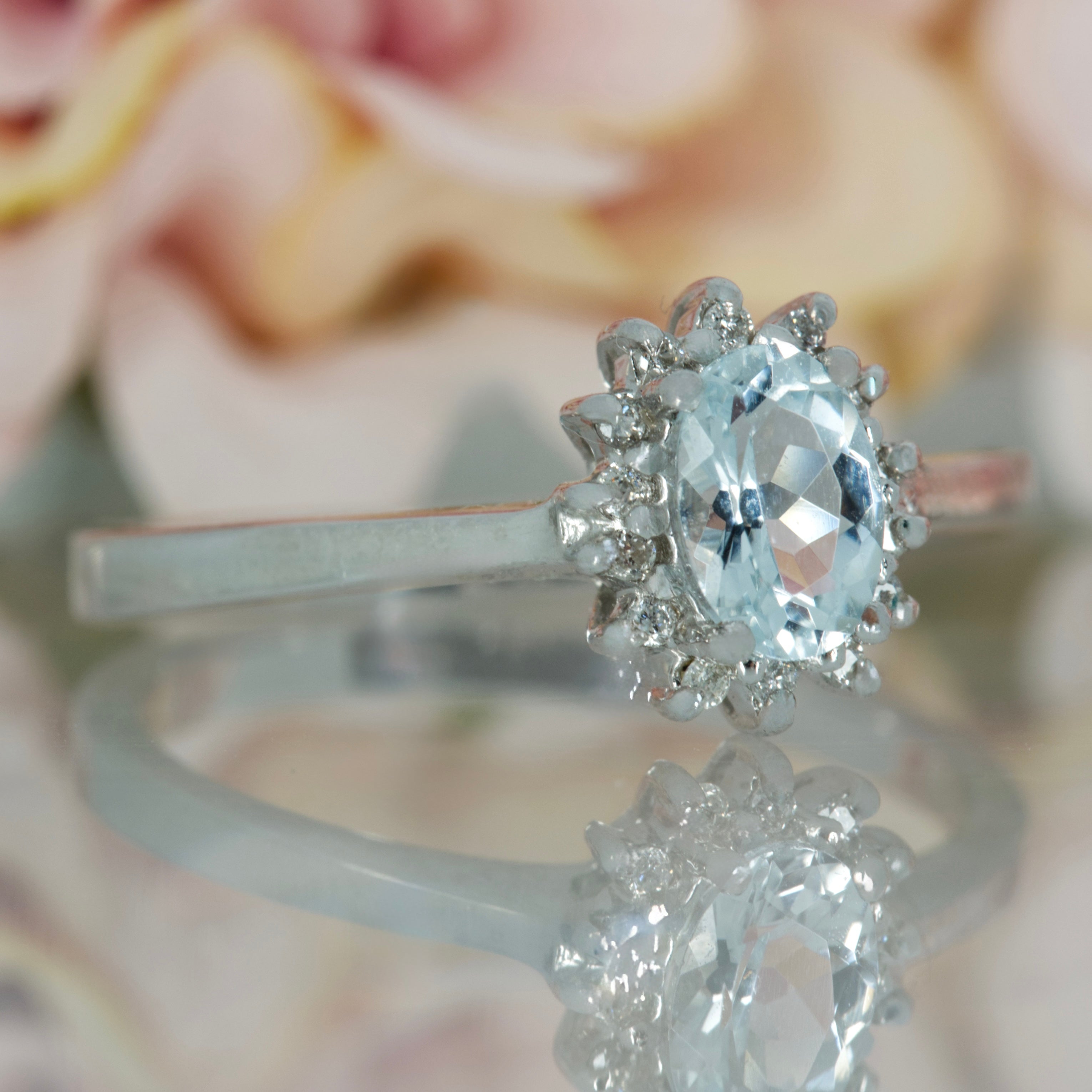 9ct White Gold Oval Cut Aquamarine & Round Brilliant Cut Diamond Cluster Ring