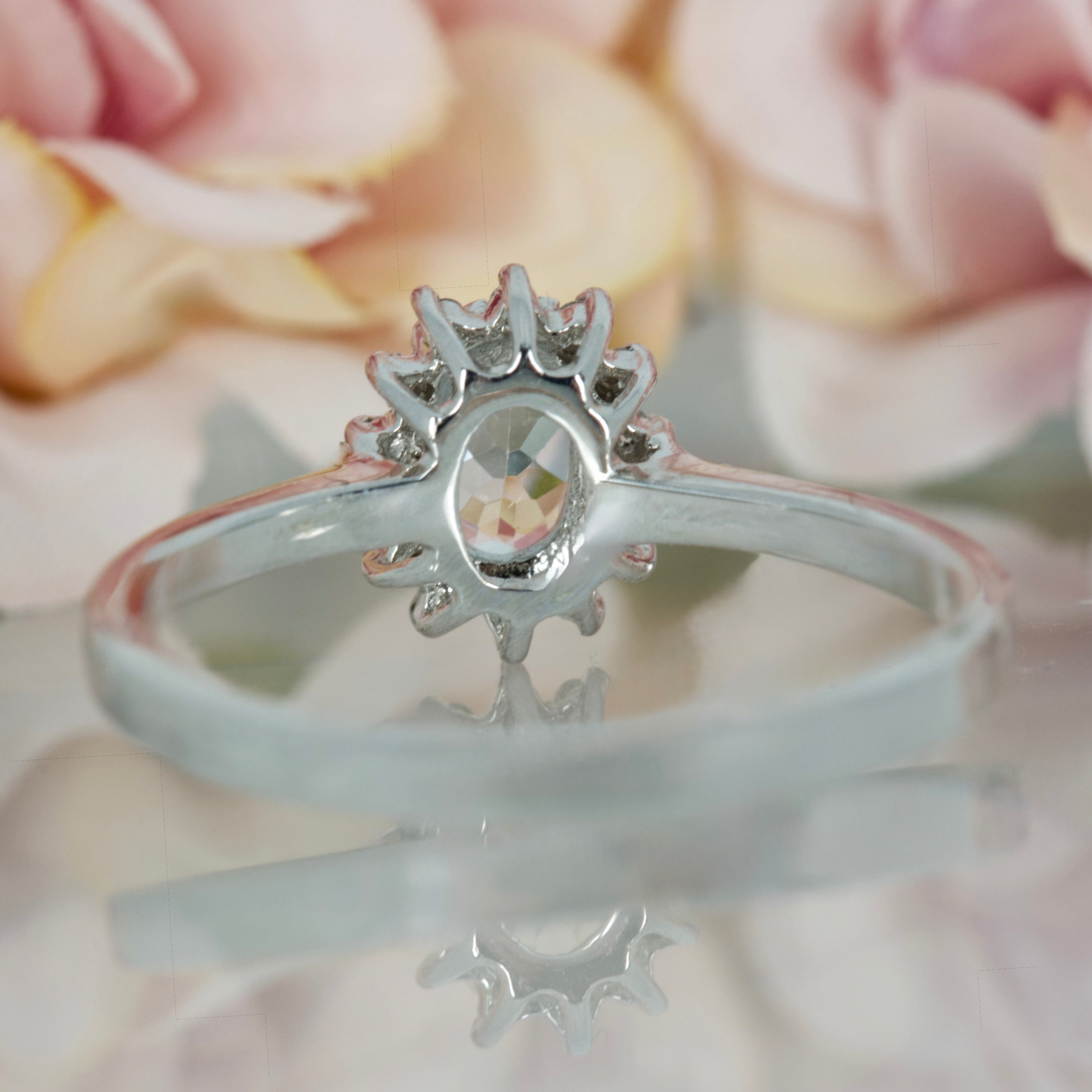 9ct White Gold Oval Cut Aquamarine & Round Brilliant Cut Diamond Cluster Ring