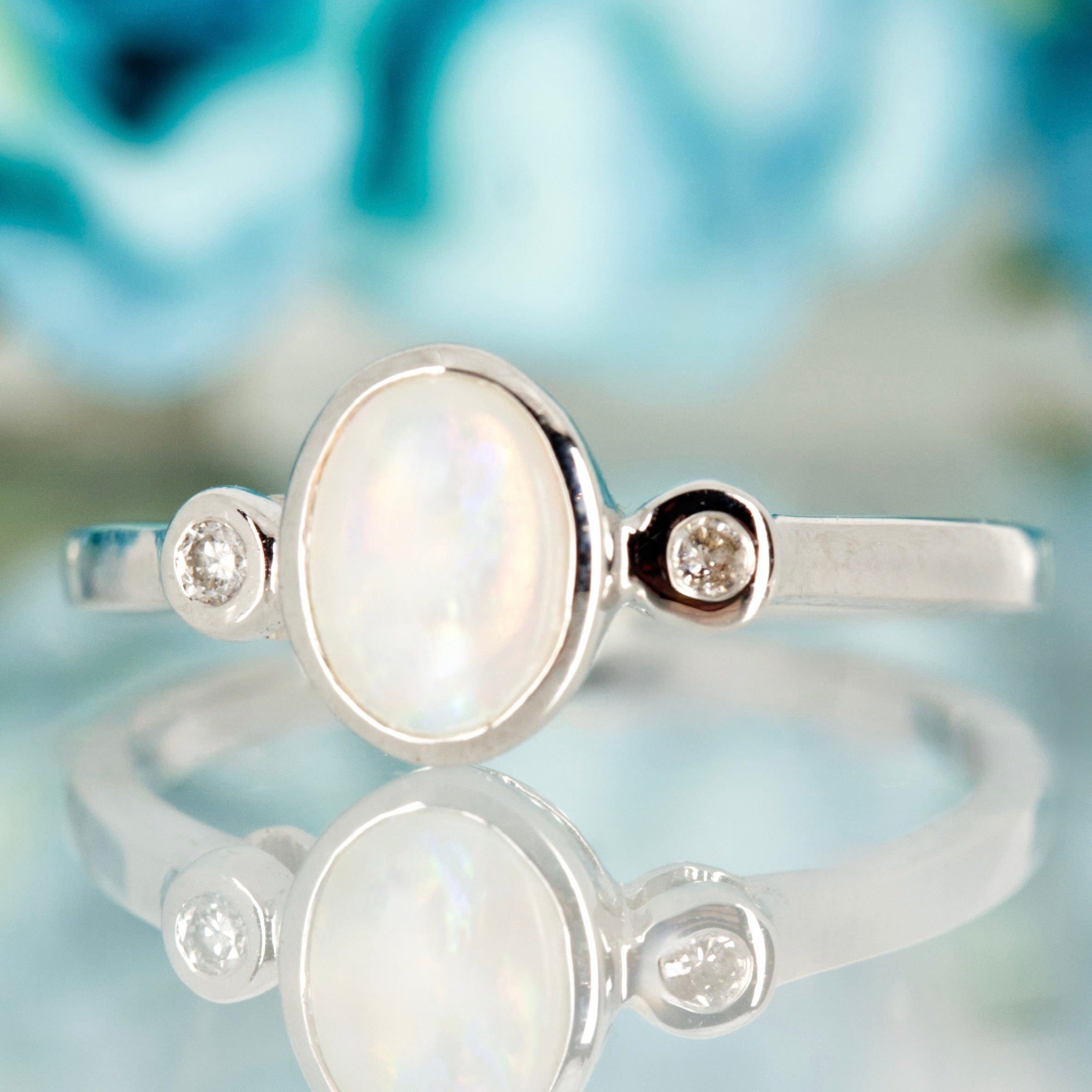 9ct White Gold Oval Opal & Round Brilliant Cut Diamond Trilogy Ring