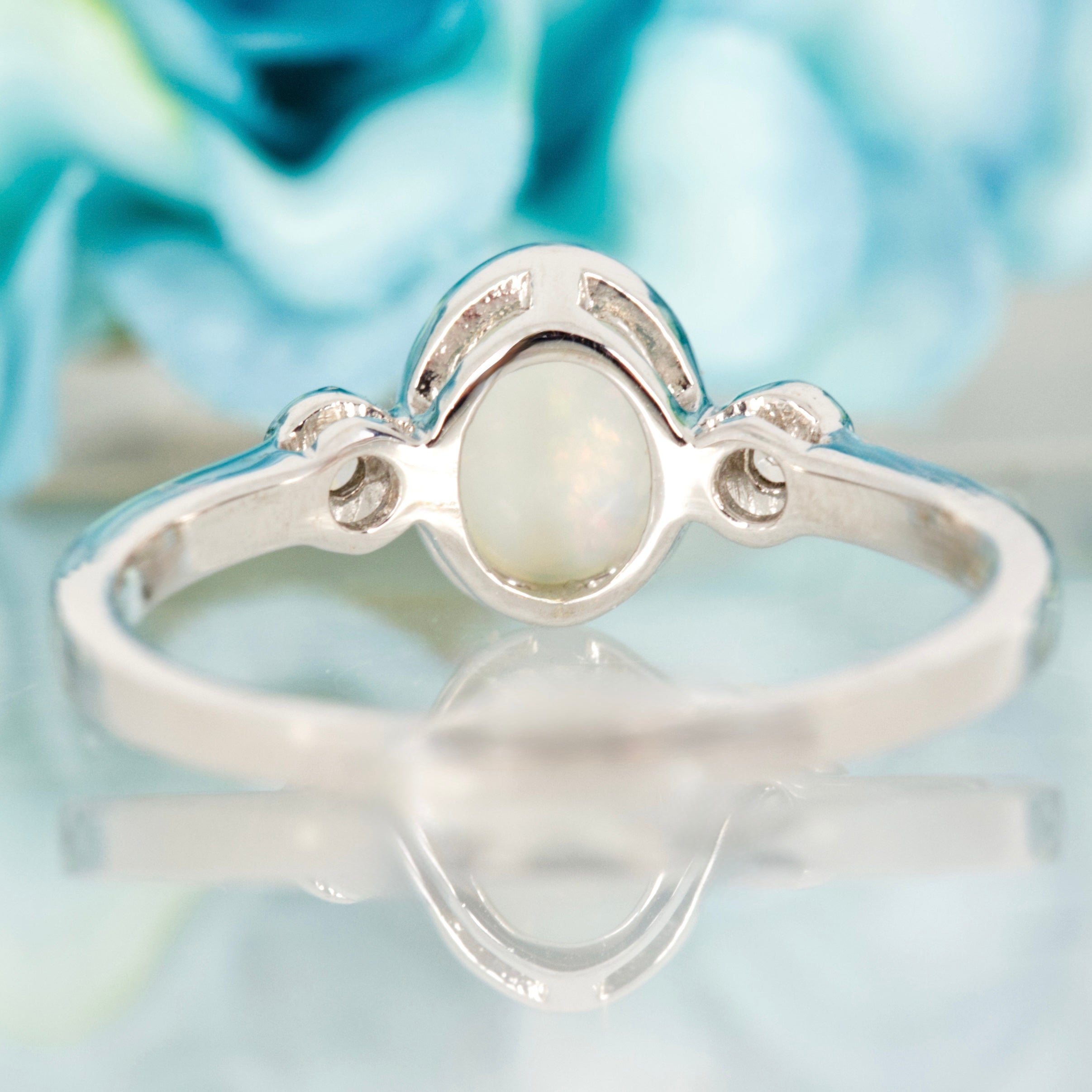 9ct White Gold Oval Opal & Round Brilliant Cut Diamond Trilogy Ring