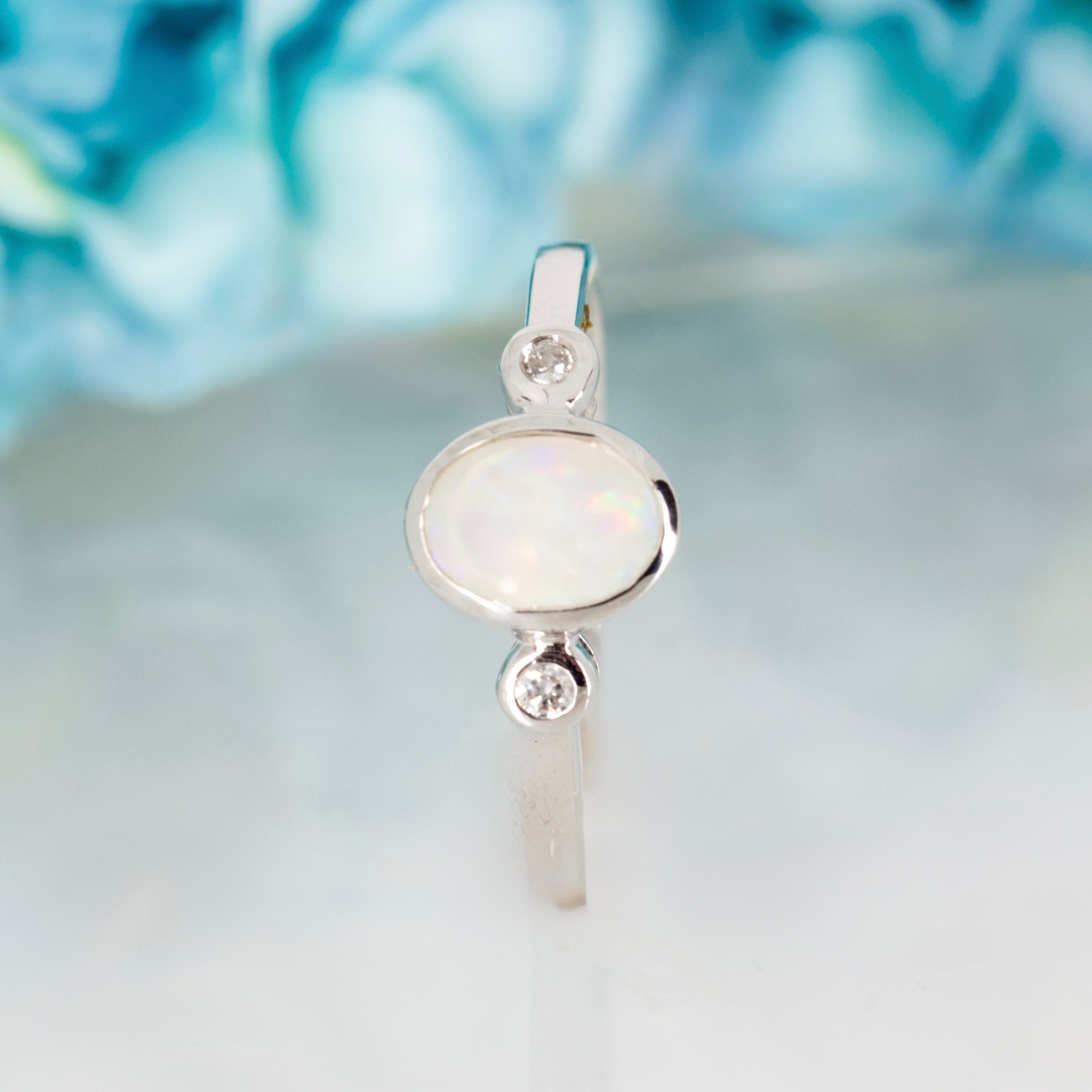 9ct White Gold Oval Opal & Round Brilliant Cut Diamond Trilogy Ring