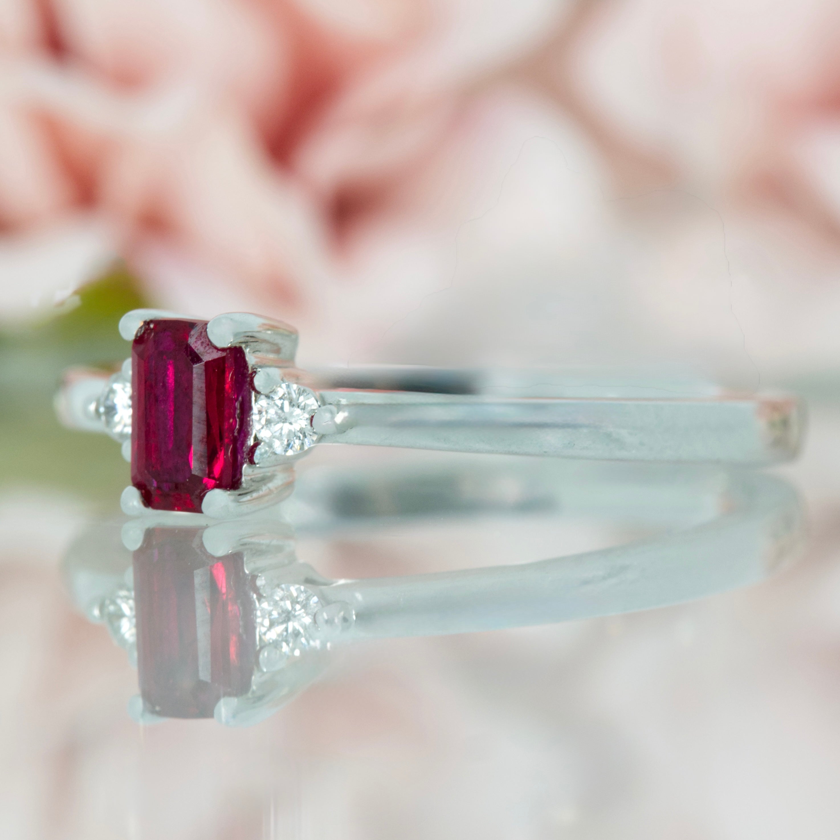 18ct White Gold Octagonal Cut Ruby & Round Brilliant Cut Diamond Trilogy Ring