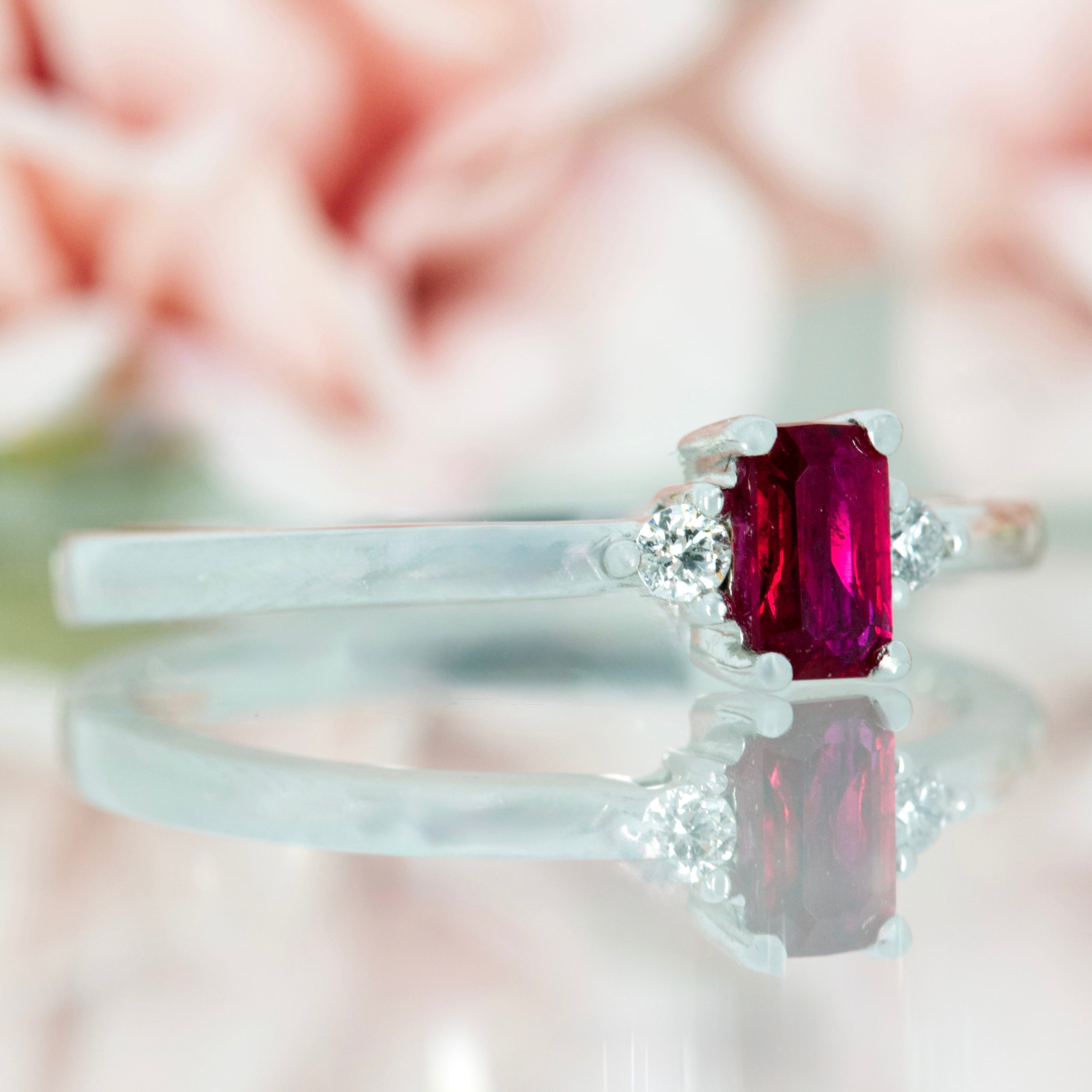 18ct White Gold Octagonal Cut Ruby & Round Brilliant Cut Diamond Trilogy Ring