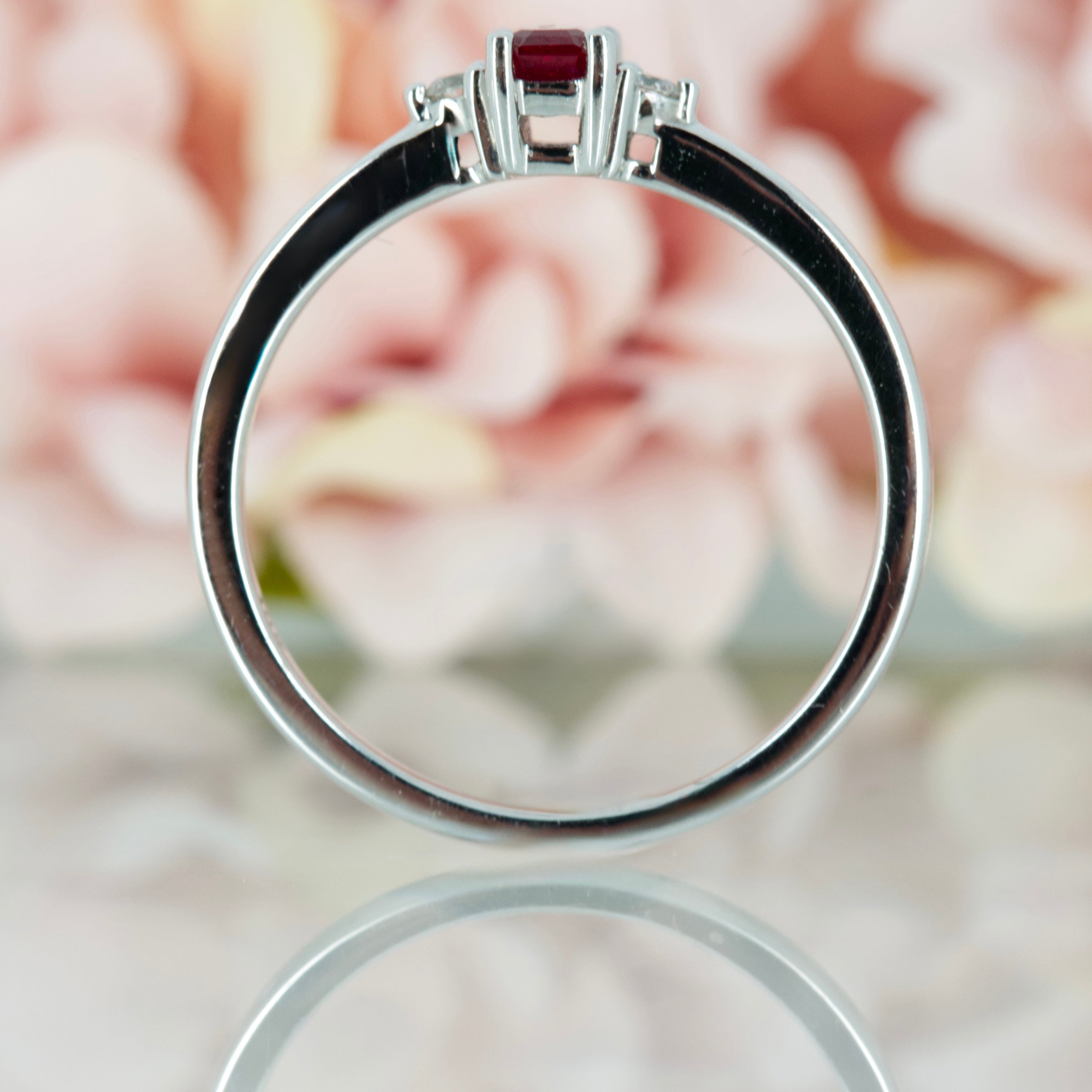 18ct White Gold Octagonal Cut Ruby & Round Brilliant Cut Diamond Trilogy Ring