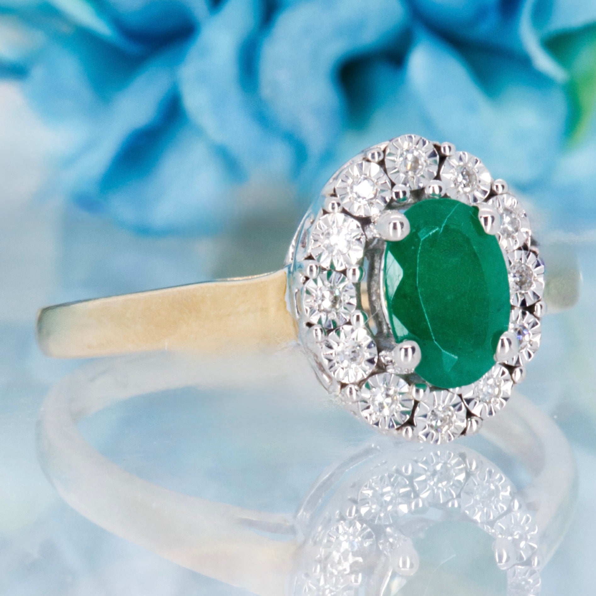 9ct Yellow Gold Oval Cut Emerald & Round Brilliant Cut Diamond Halo Cluster Ring