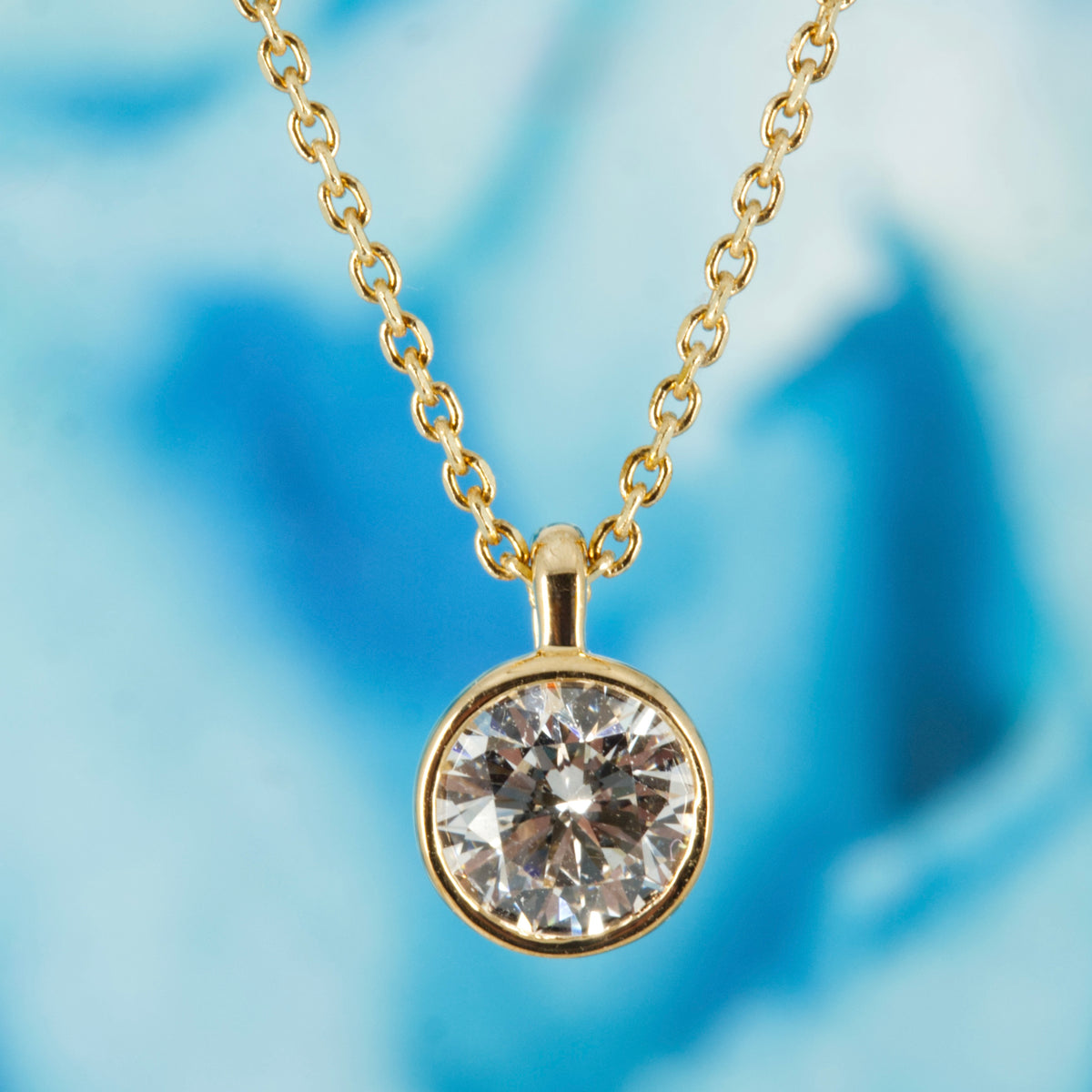 9ct Yellow Gold 0.50ct Round Brilliant Cut Lab Grown Diamond Pendant on a 16”-18” Chain