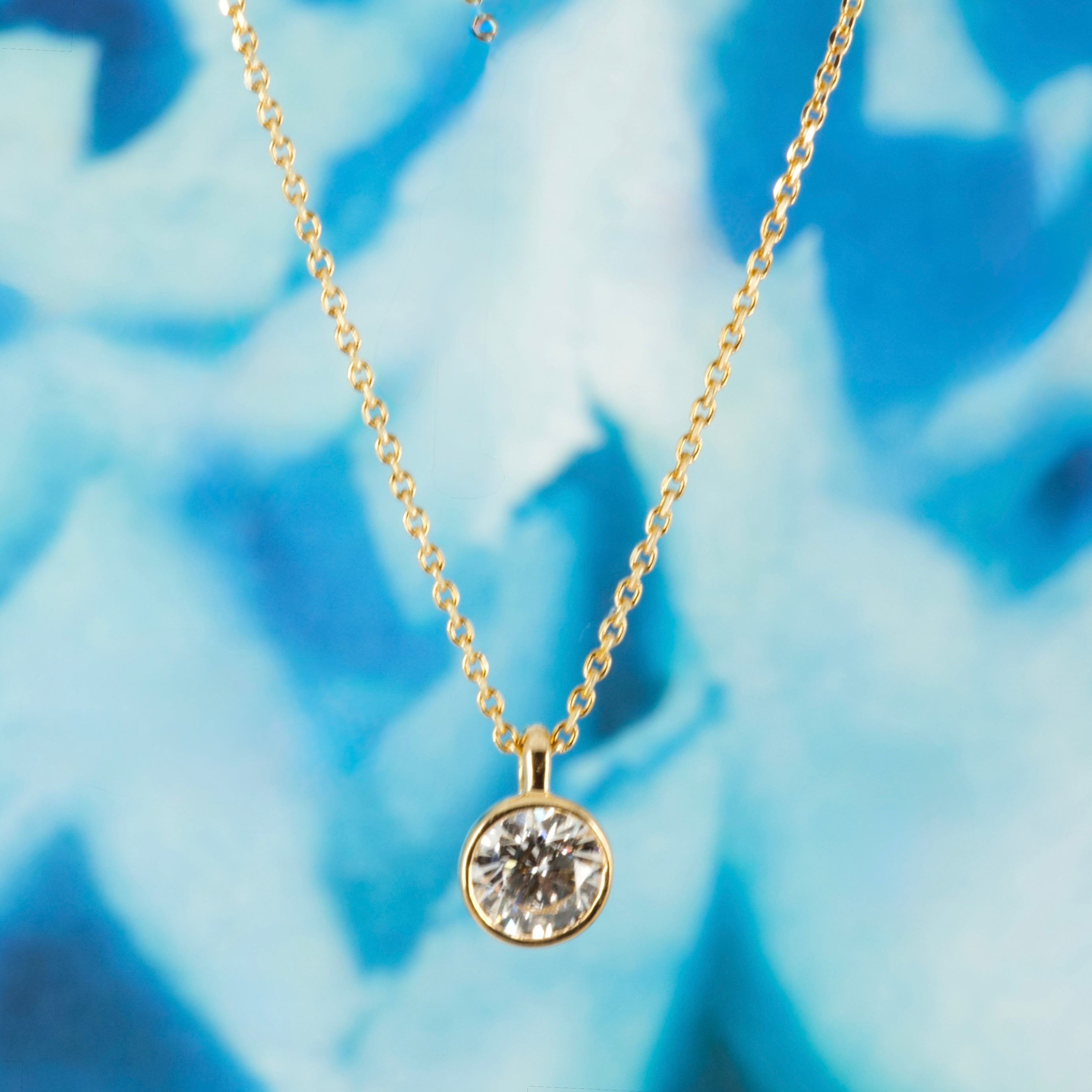 9ct Yellow Gold 0.50ct Round Brilliant Cut Lab Grown Diamond Pendant on a 16”-18” Chain