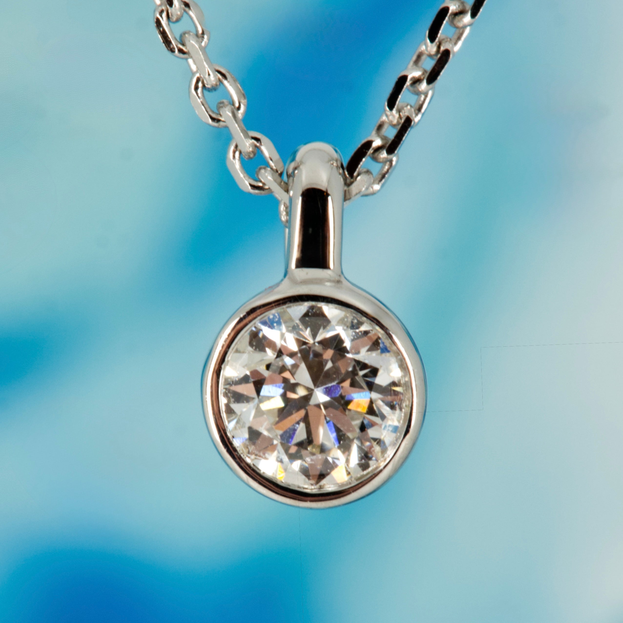 9ct White Gold 0.15ct Round Brilliant Cut Lab Grown Diamond Pendant on a 16”-18” Chain
