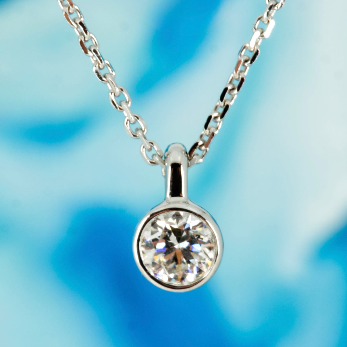9ct White Gold 0.15ct Round Brilliant Cut Lab Grown Diamond Pendant on a 16”-18” Chain