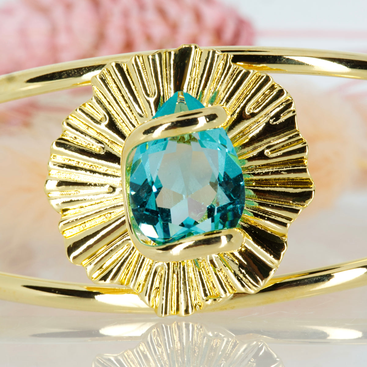 Andrea Marazzini Gold Plated Blue Pear Shaped Crystal Cuff Bangle