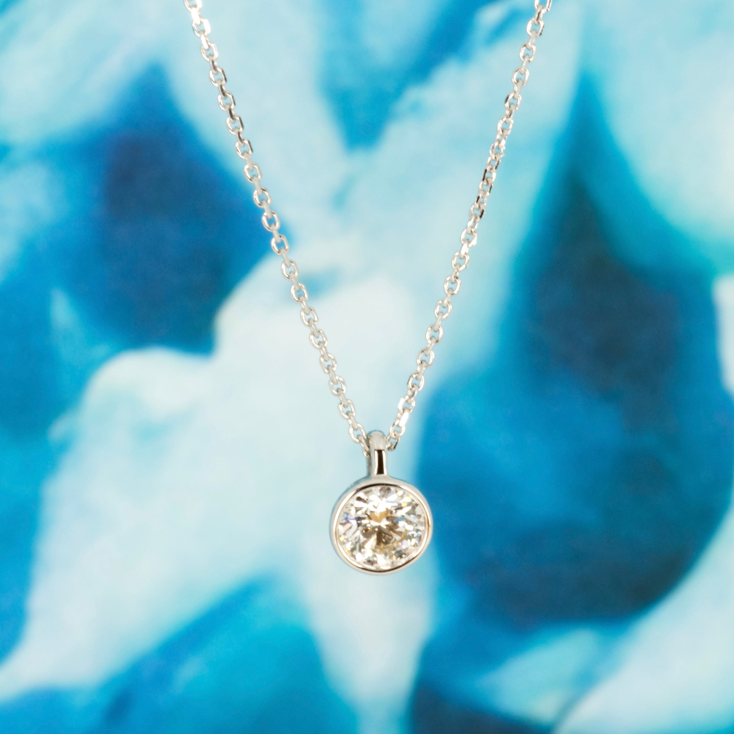9ct White Gold 0.50ct Round Brilliant Cut Lab Grown Diamond Pendant on a 16”-18” Chain